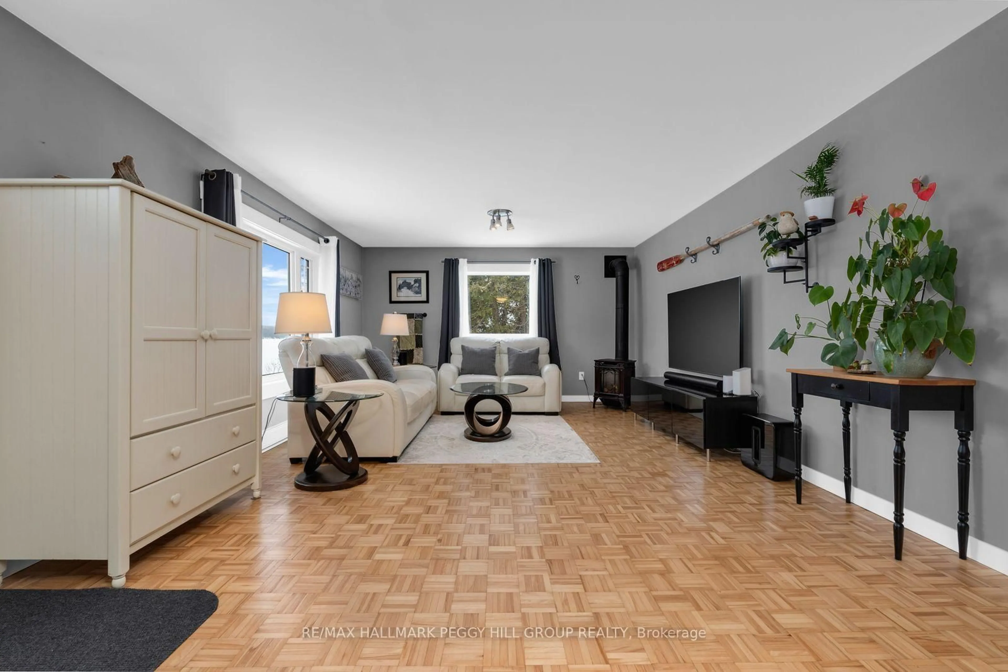 Living room with furniture, unknown for 5724 & 1 Penetanguishene Road & Cedar Lane, Springwater Ontario L0L 1P0