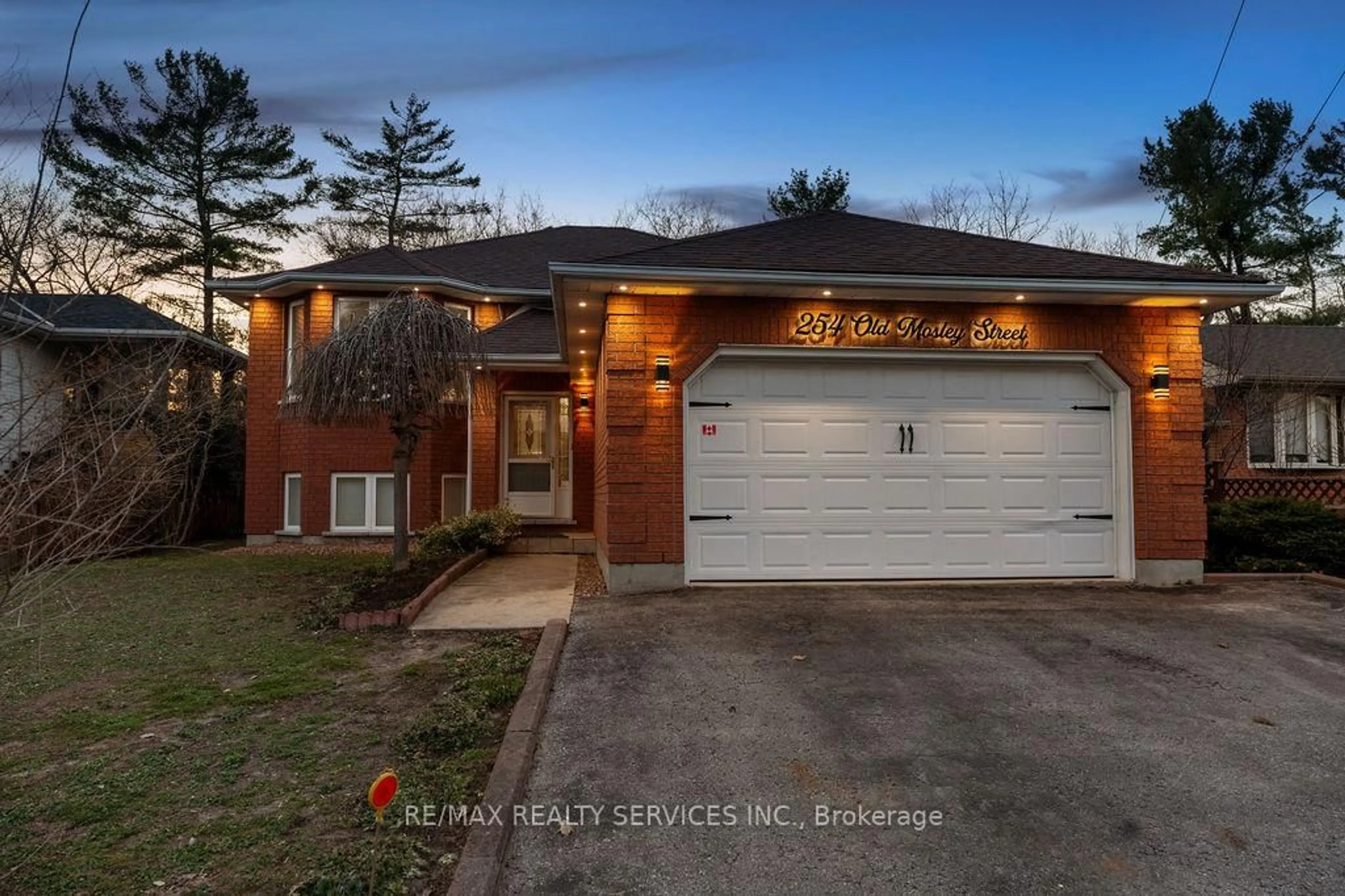 Home with brick exterior material, street for 254 Old Mosley St, Wasaga Beach Ontario L9Z 2H8