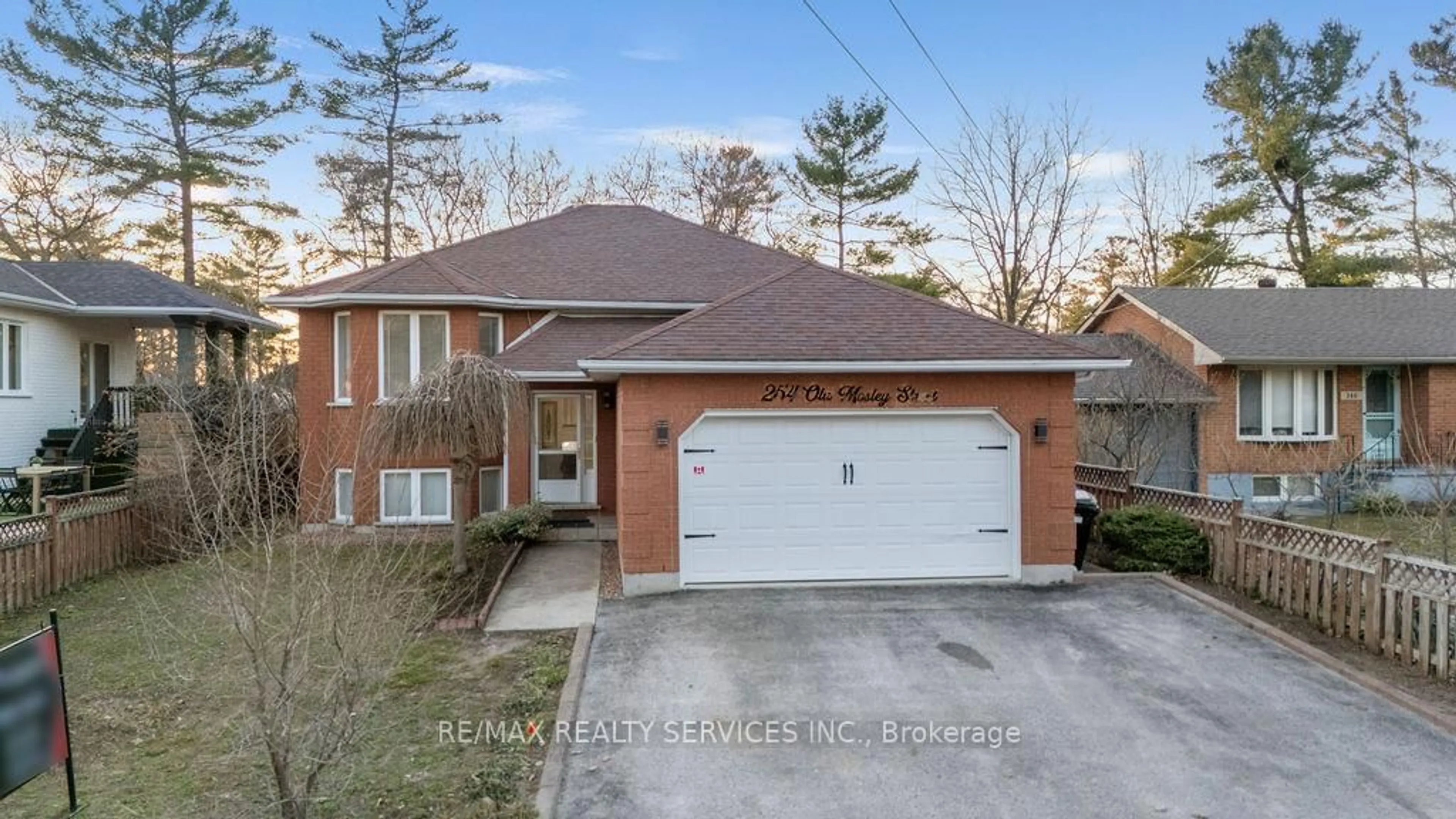 Home with brick exterior material, street for 254 Old Mosley St, Wasaga Beach Ontario L9Z 2H8