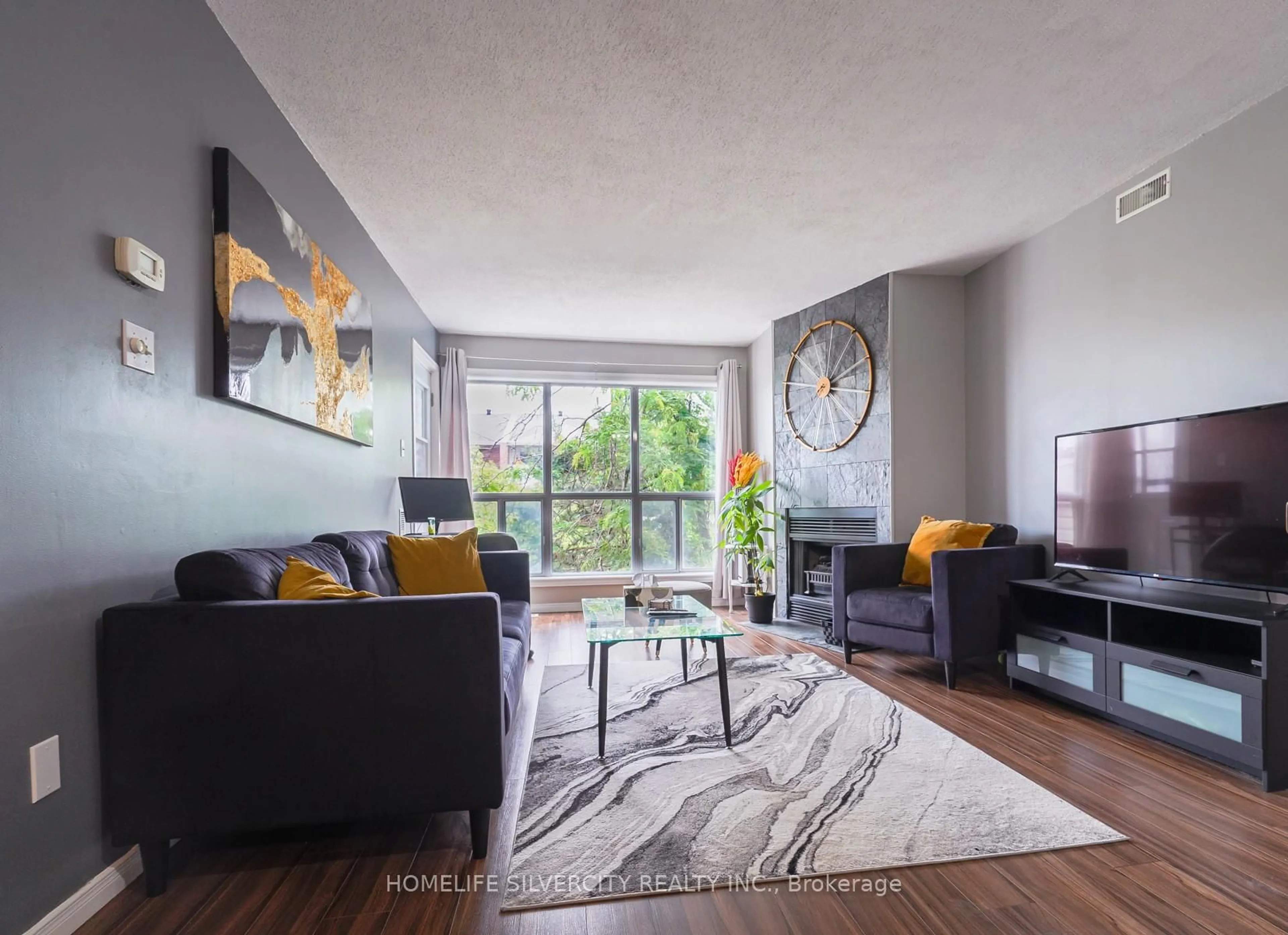 Living room with furniture, unknown for 120 Bell Farm Rd #316, Barrie Ontario L4M 6J2