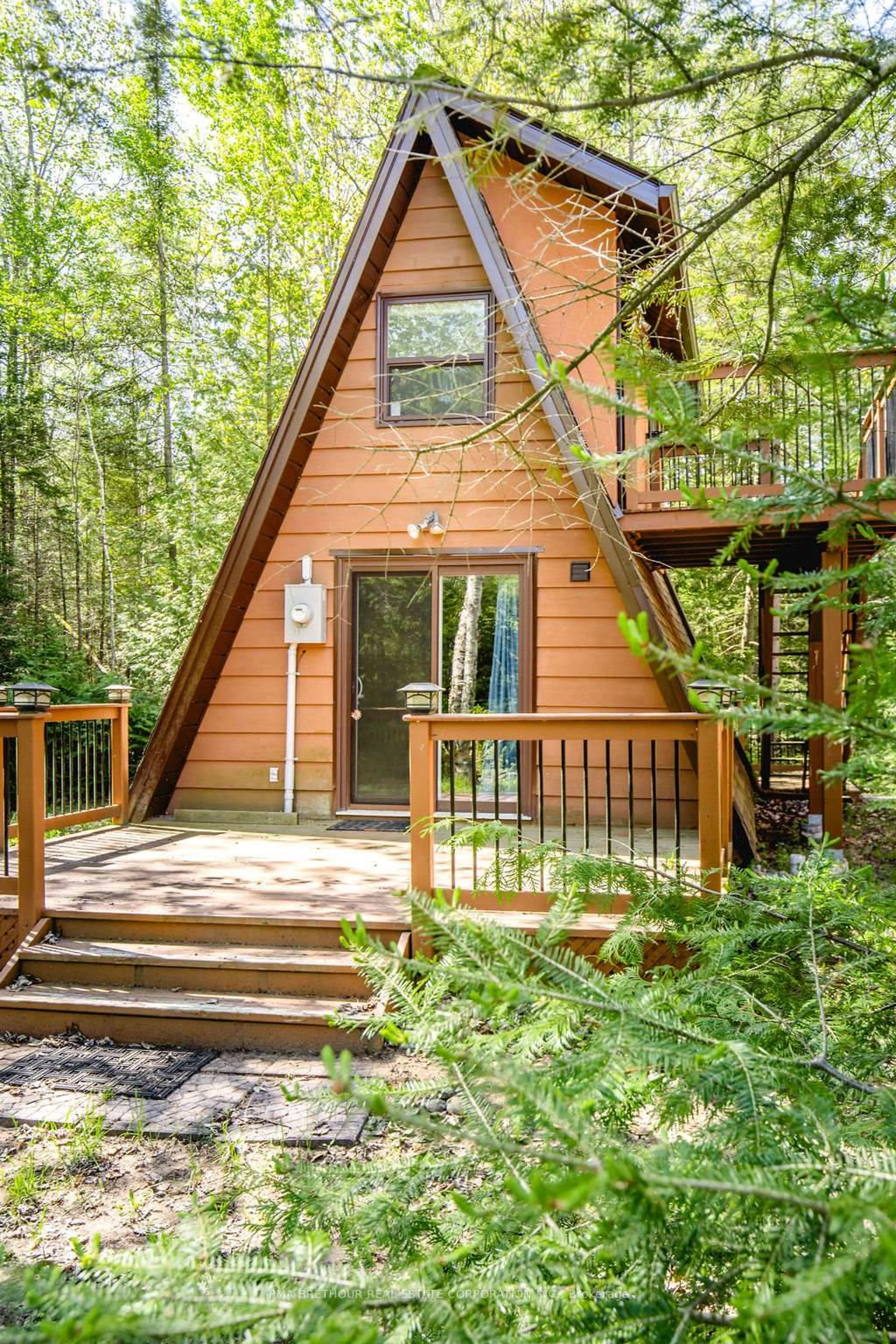 Home with vinyl exterior material, forest/trees view for 56 Birch Tr, Wasaga Beach Ontario L9Z 2S1