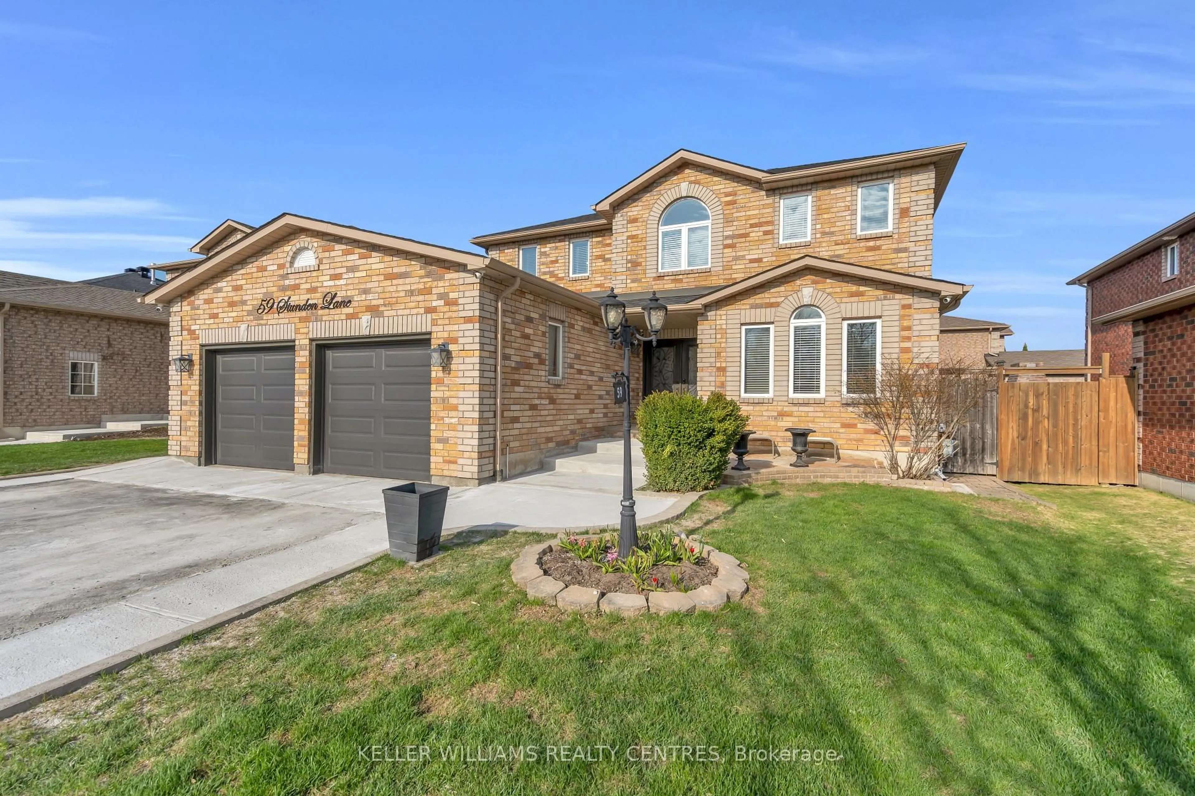 Home with brick exterior material, street for 59 Stunden Lane, Barrie Ontario L4N 5Z1