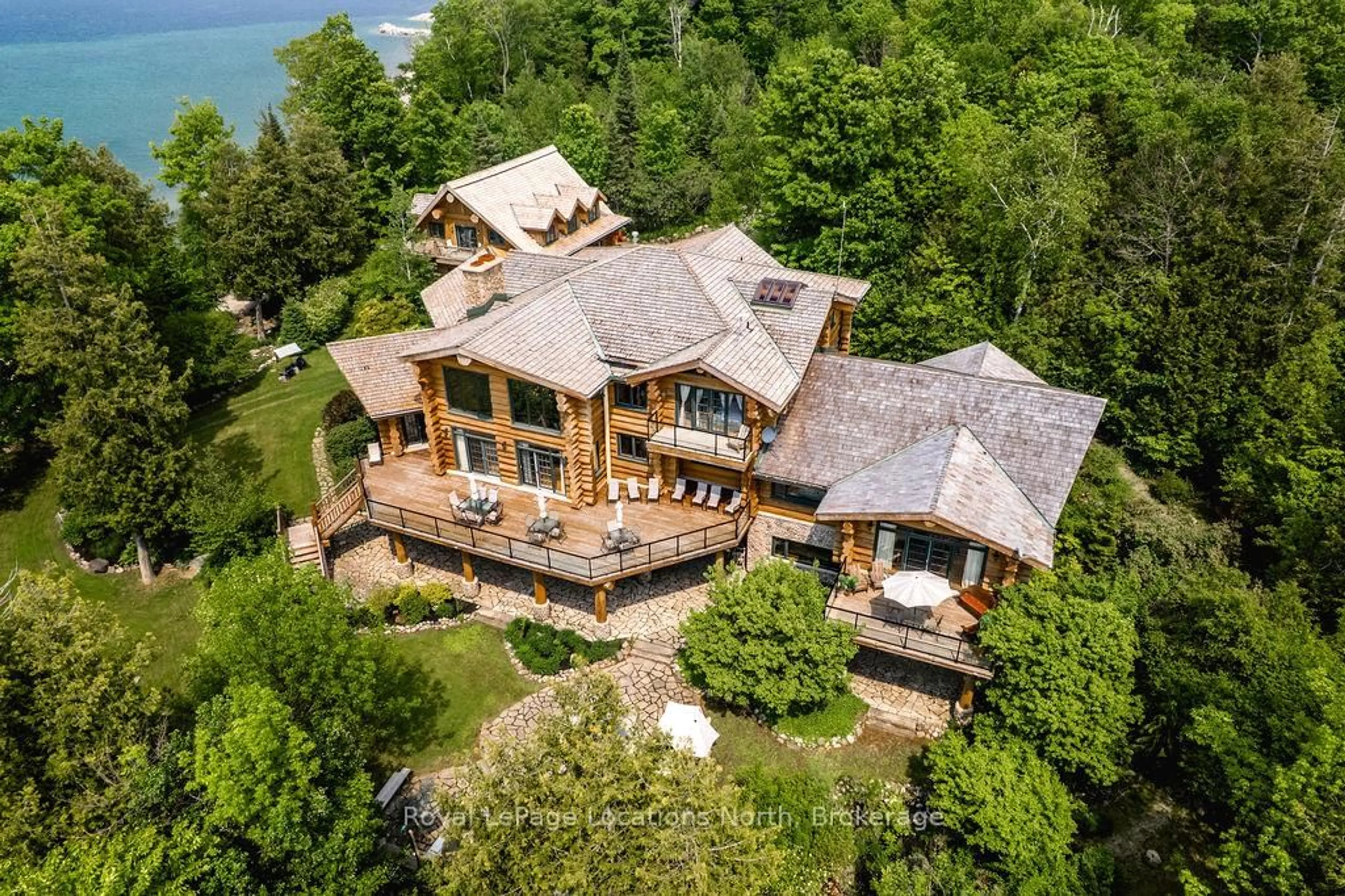 A pic from outside/outdoor area/front of a property/back of a property/a pic from drone, water/lake/river/ocean view for 100 Melissa Lane, Tiny Ontario L9M 0T8