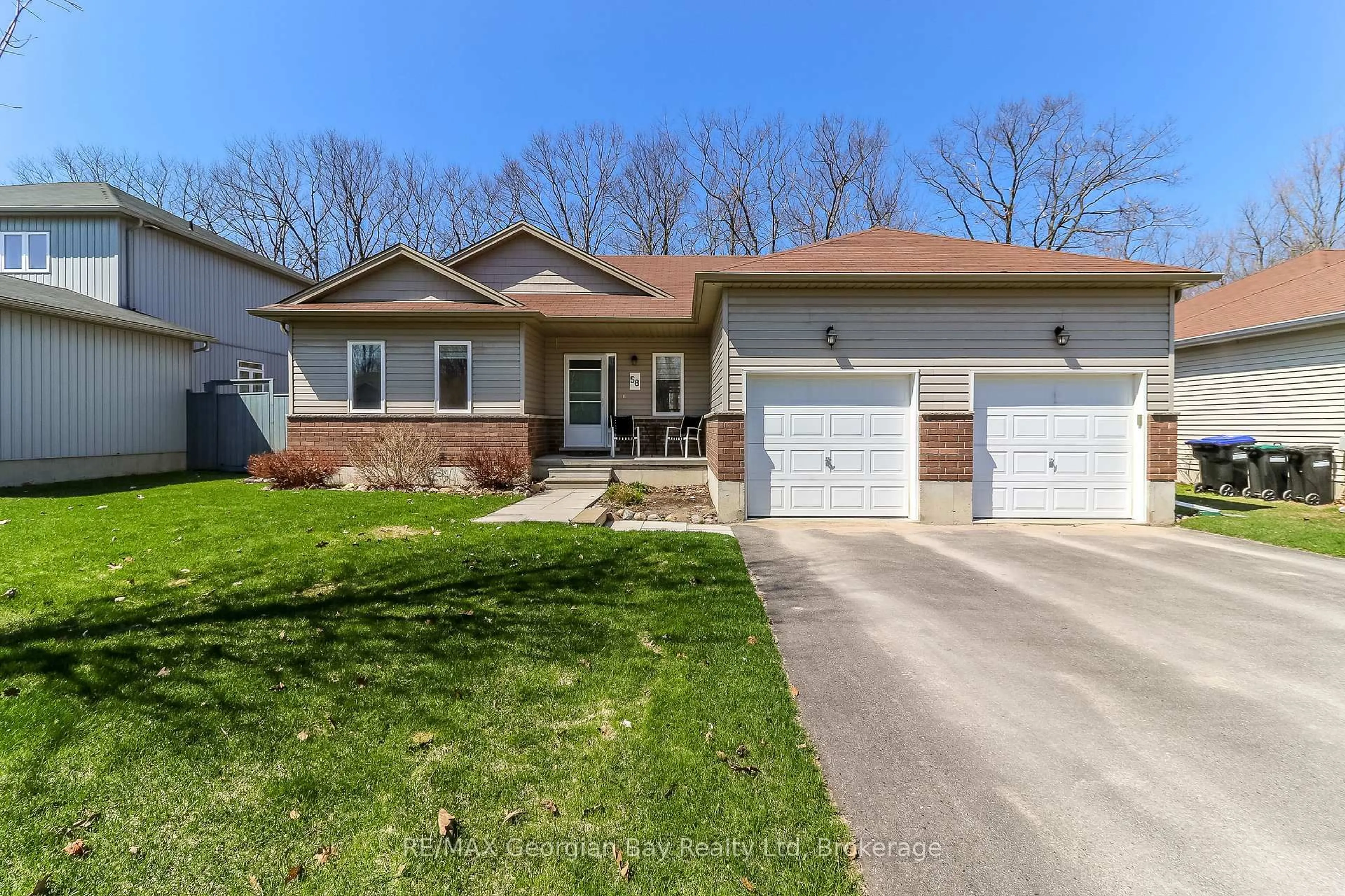 Home with brick exterior material, street for 58 Mcdermitt Tr, Tay Ontario L0K 2A0