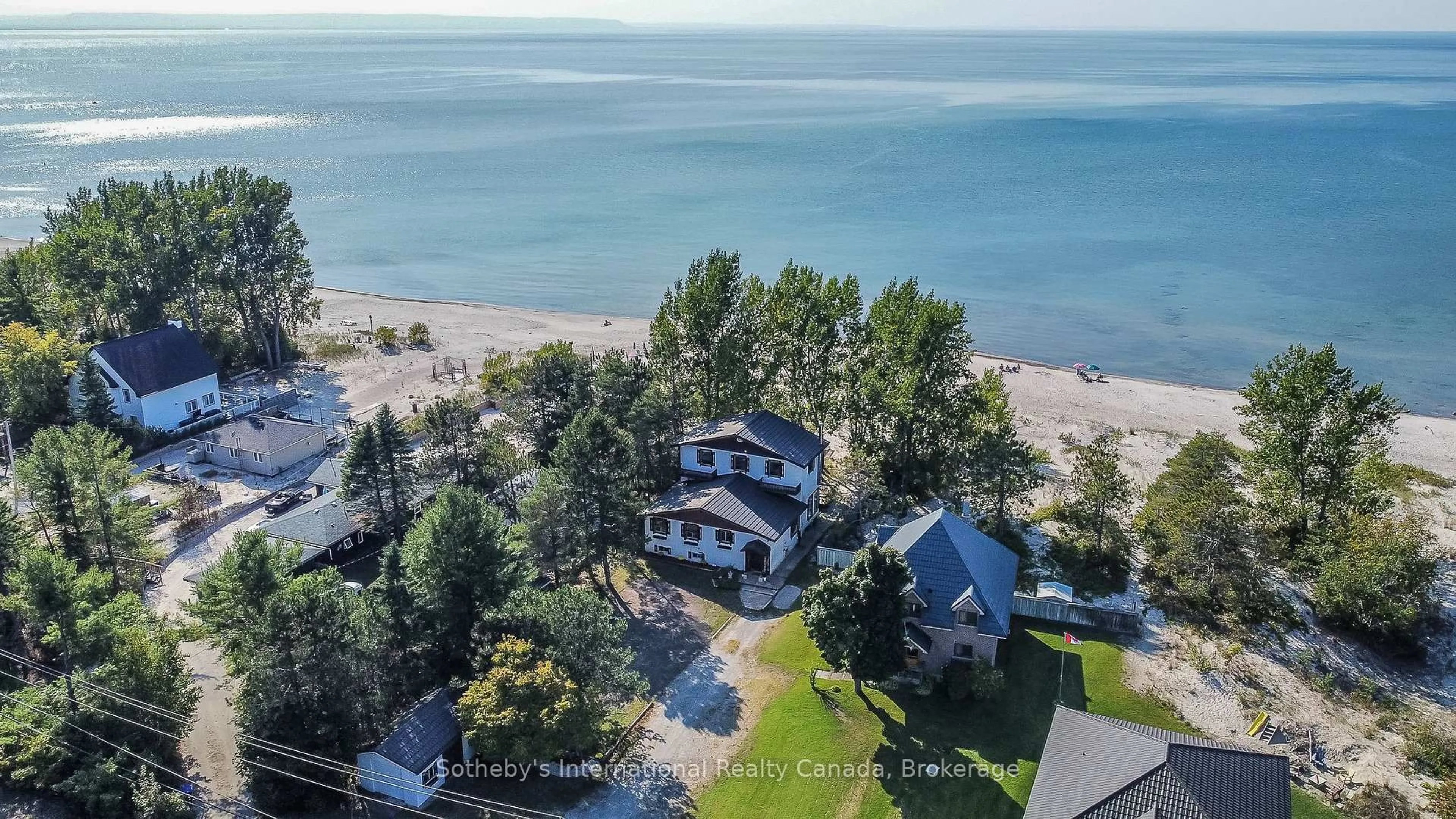 A pic from outside/outdoor area/front of a property/back of a property/a pic from drone, water/lake/river/ocean view for 14 JAMES St, Tiny Ontario L0L 2T0