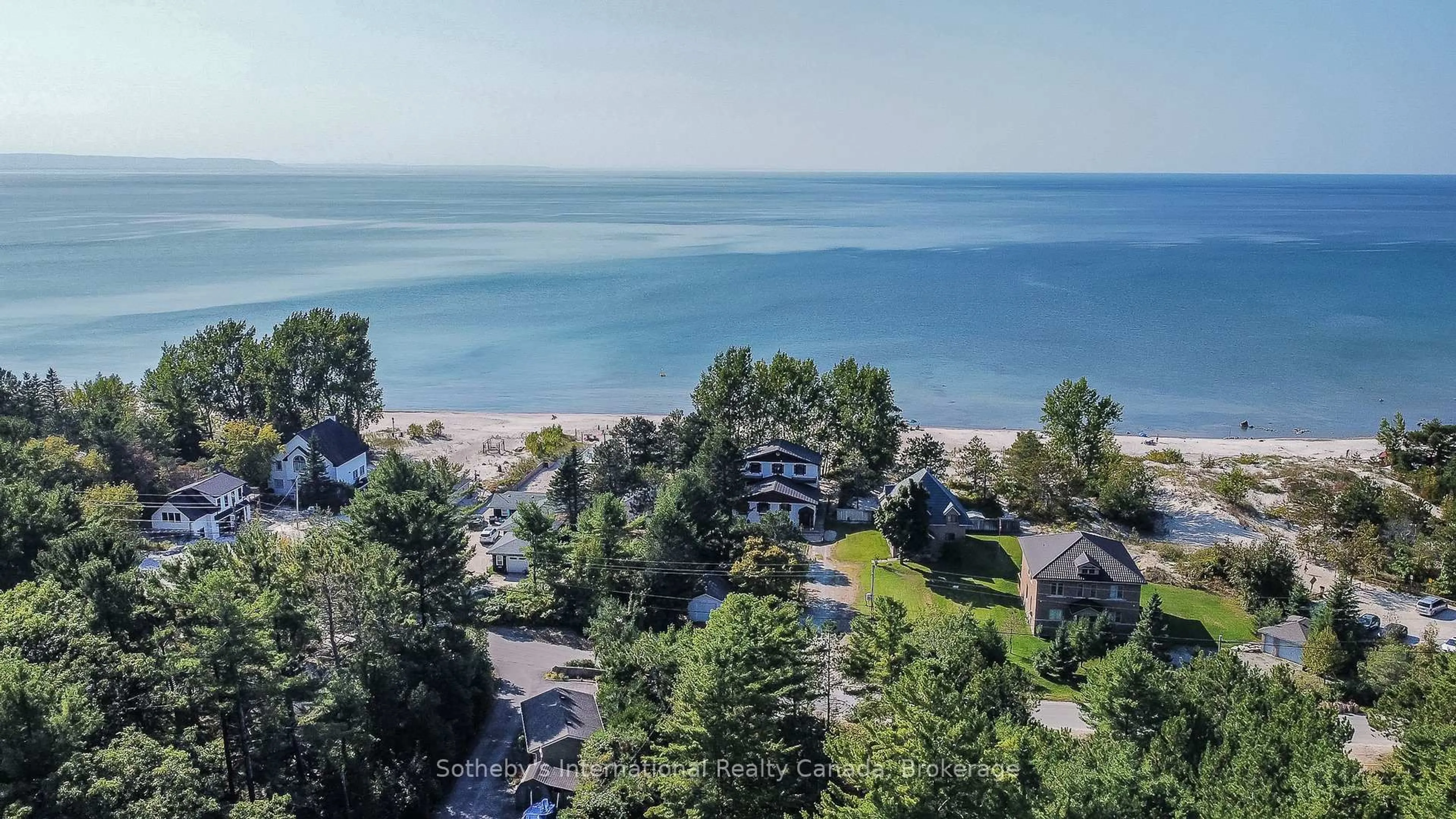 A pic from outside/outdoor area/front of a property/back of a property/a pic from drone, water/lake/river/ocean view for 14 JAMES St, Tiny Ontario L0L 2T0