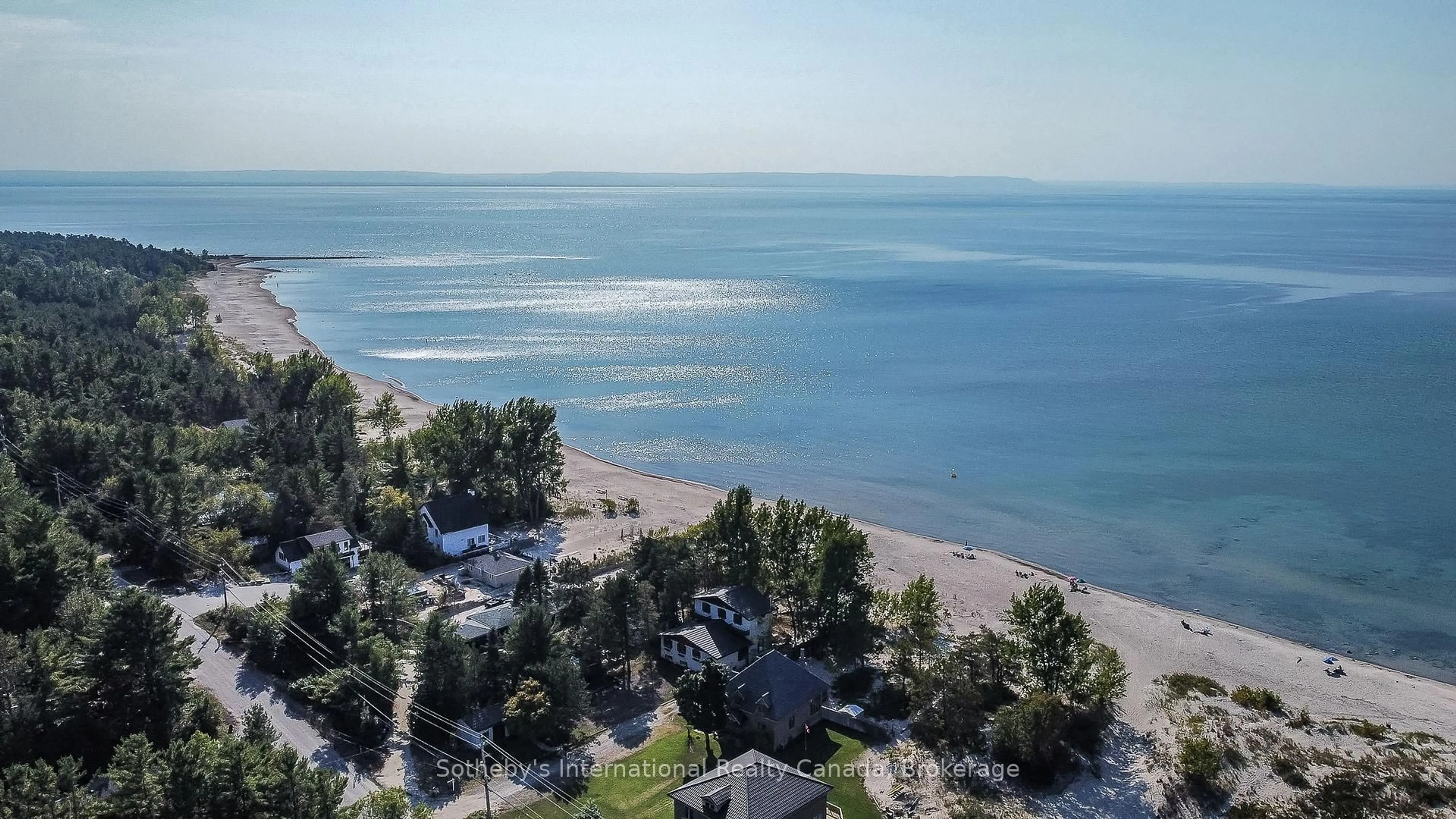 A pic from outside/outdoor area/front of a property/back of a property/a pic from drone, water/lake/river/ocean view for 14 JAMES St, Tiny Ontario L0L 2T0