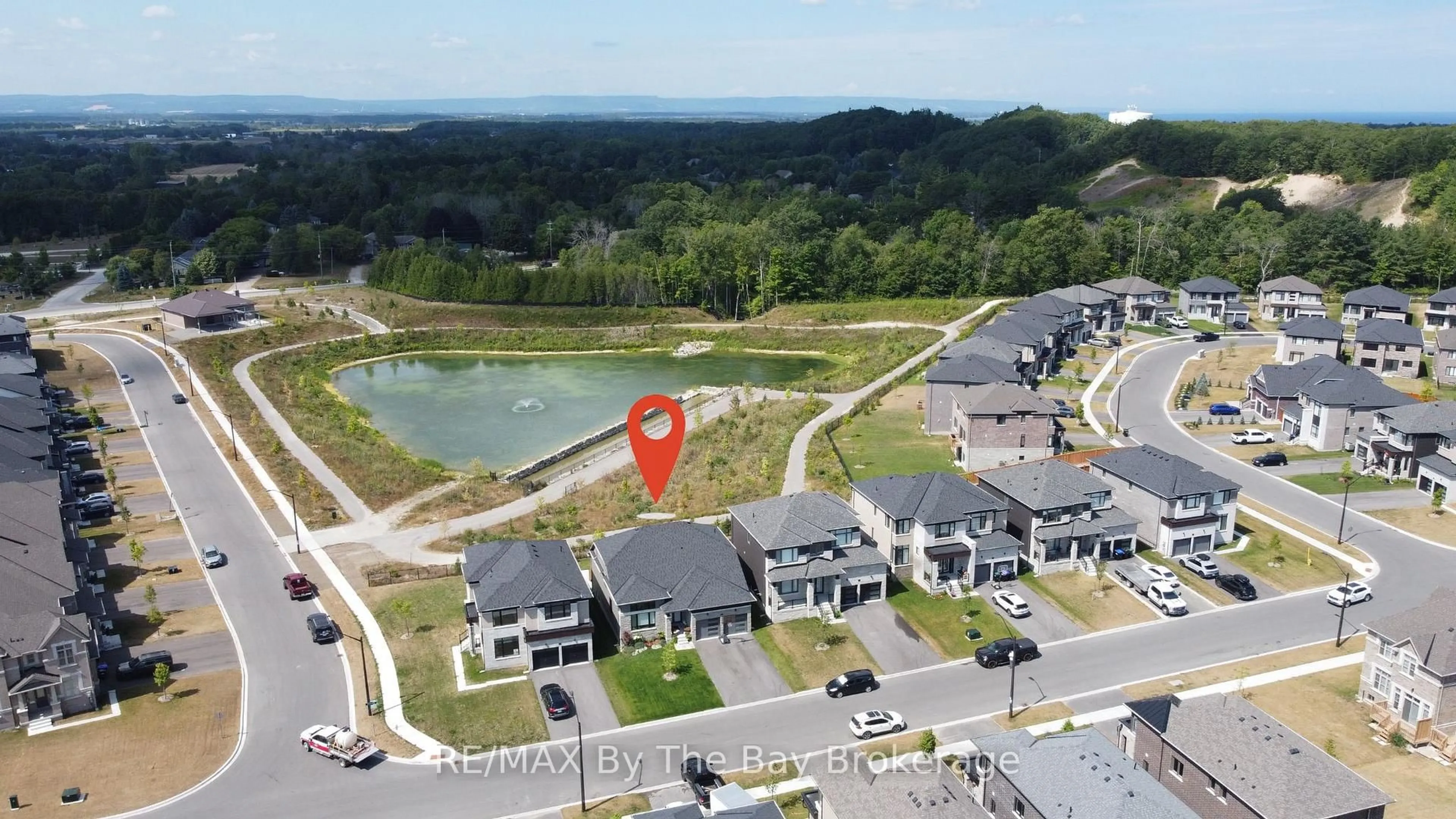 A pic from outside/outdoor area/front of a property/back of a property/a pic from drone, water/lake/river/ocean view for 33 Nicort Rd, Wasaga Beach Ontario L9Z 1J7