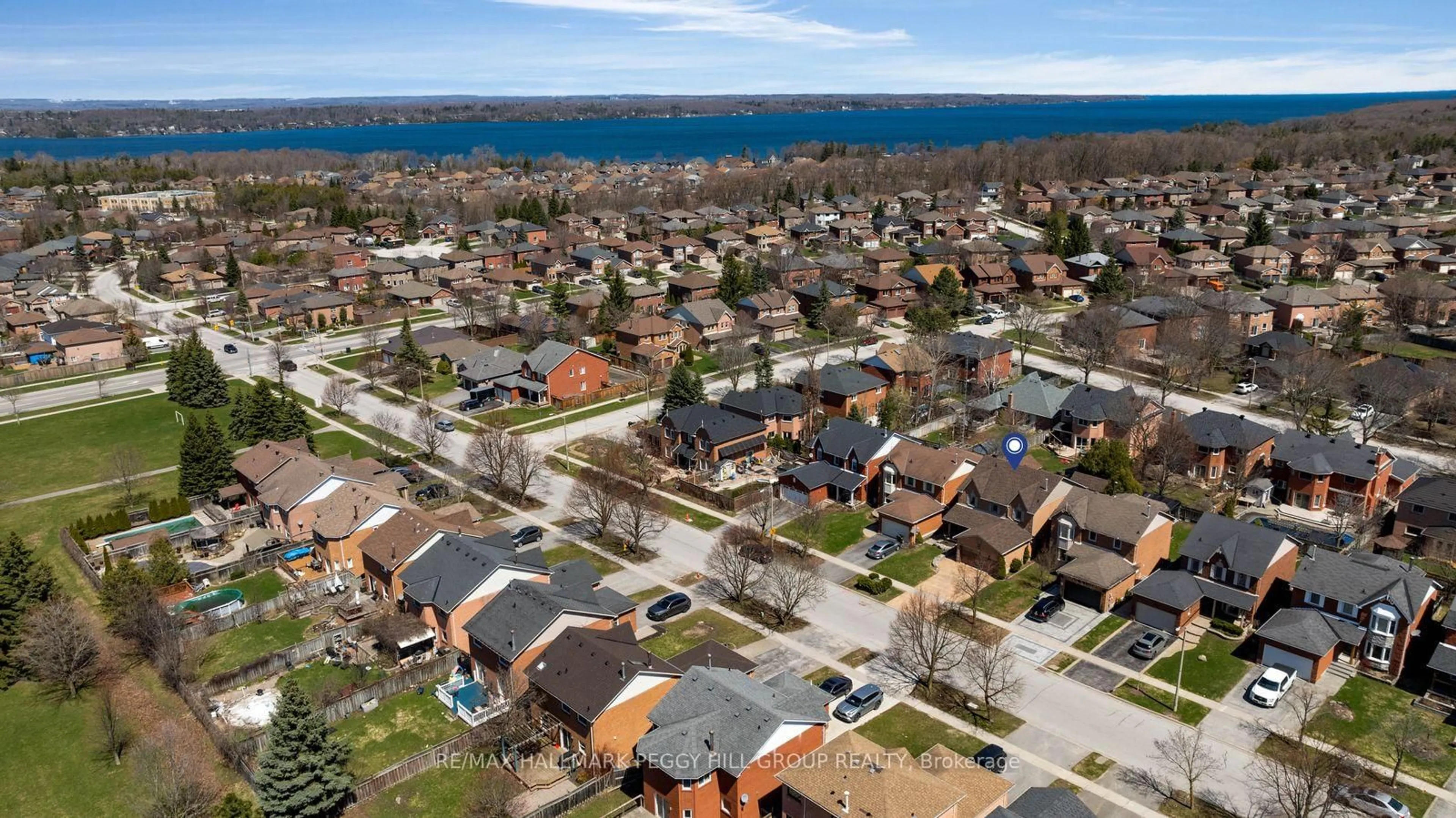 A pic from outside/outdoor area/front of a property/back of a property/a pic from drone, water/lake/river/ocean view for 99 Golden Meadow Rd, Barrie Ontario L4N 7G3