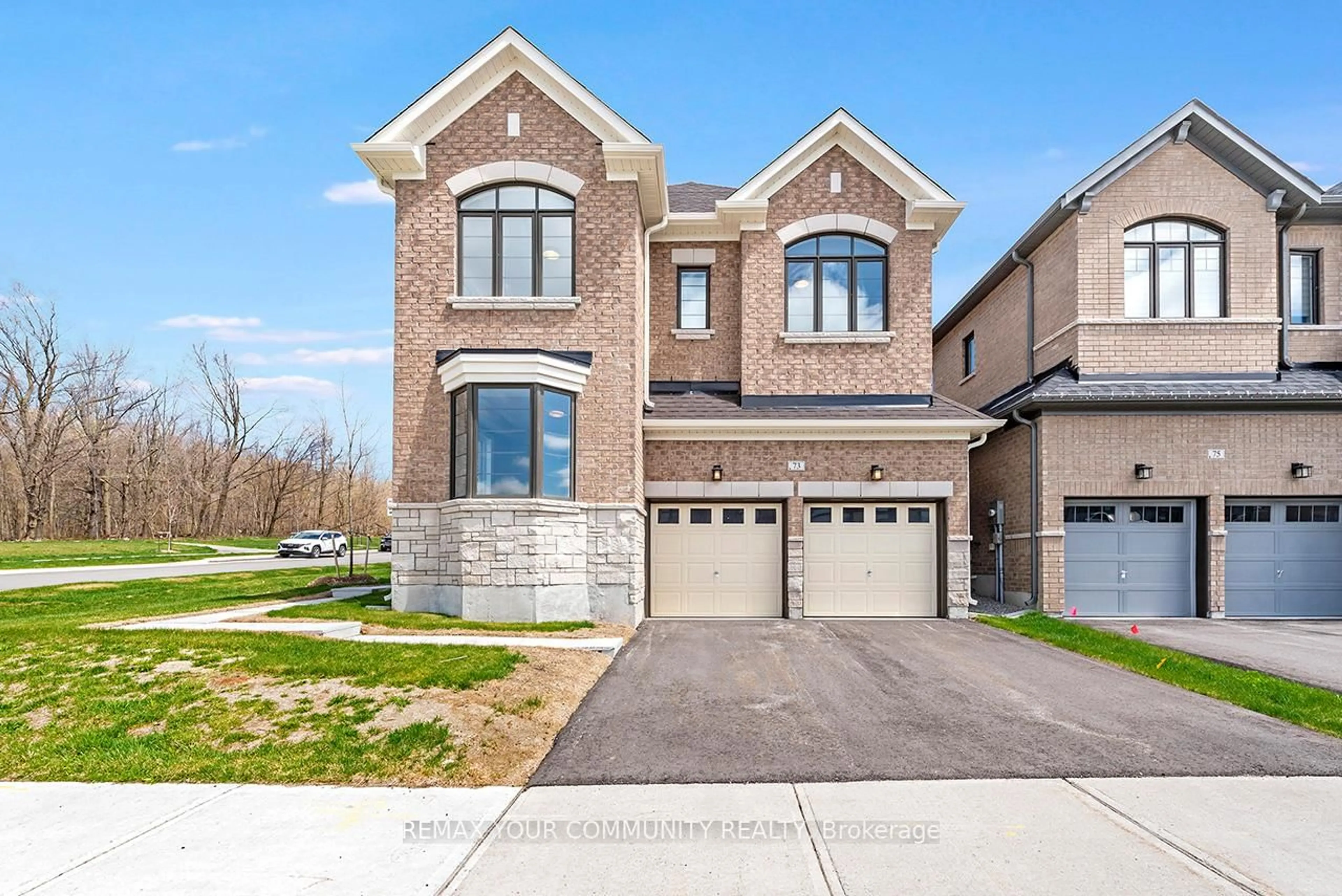 Home with brick exterior material, street for 73 Bearberry Rd, Springwater Ontario L9X 2C9