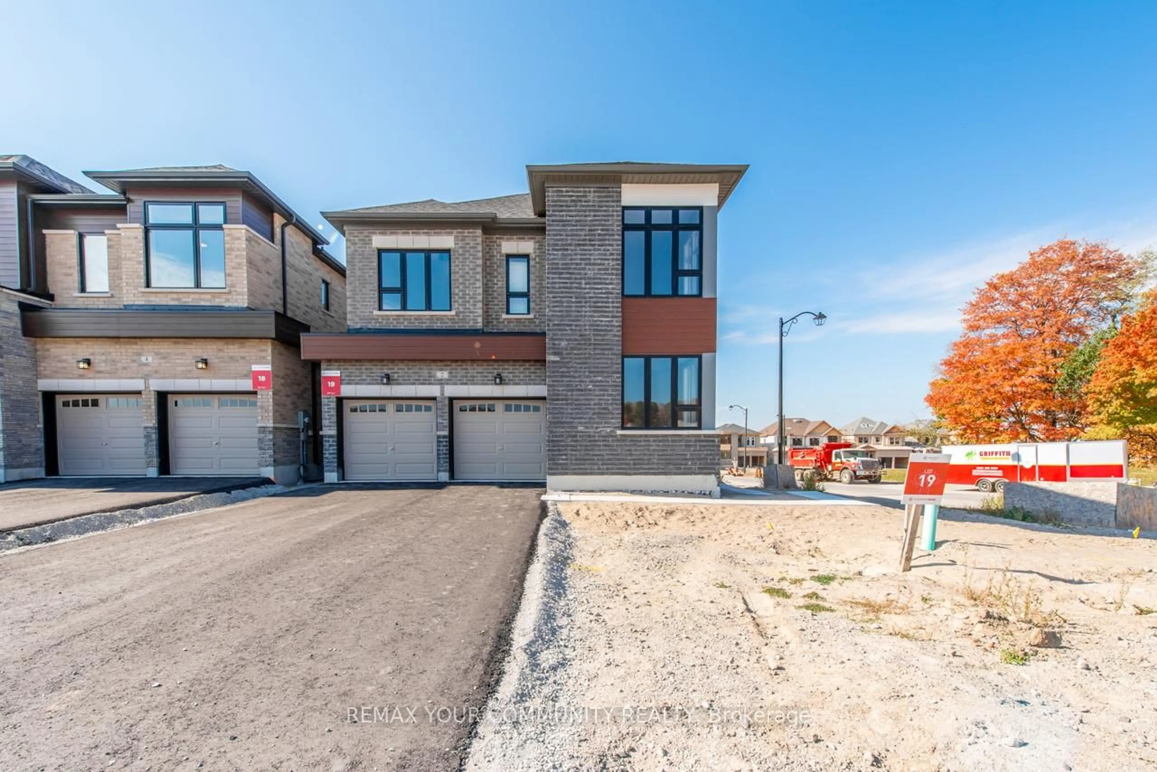 Home with brick exterior material, street for 2 Wild Ginger Lane, Springwater Ontario L9X 2C9