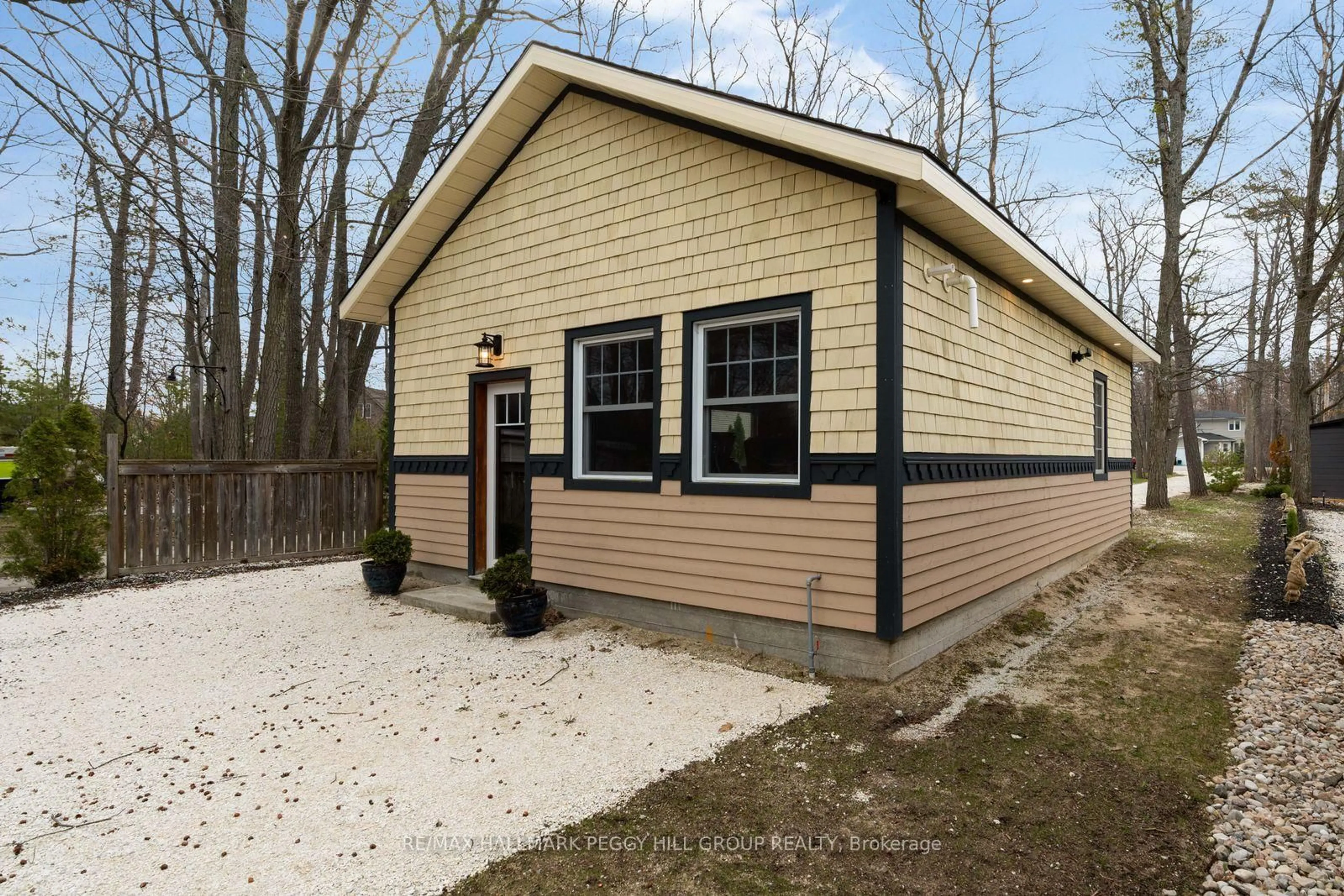 Home with vinyl exterior material, street for 2026 River Rd, Wasaga Beach Ontario L9Z 2W1