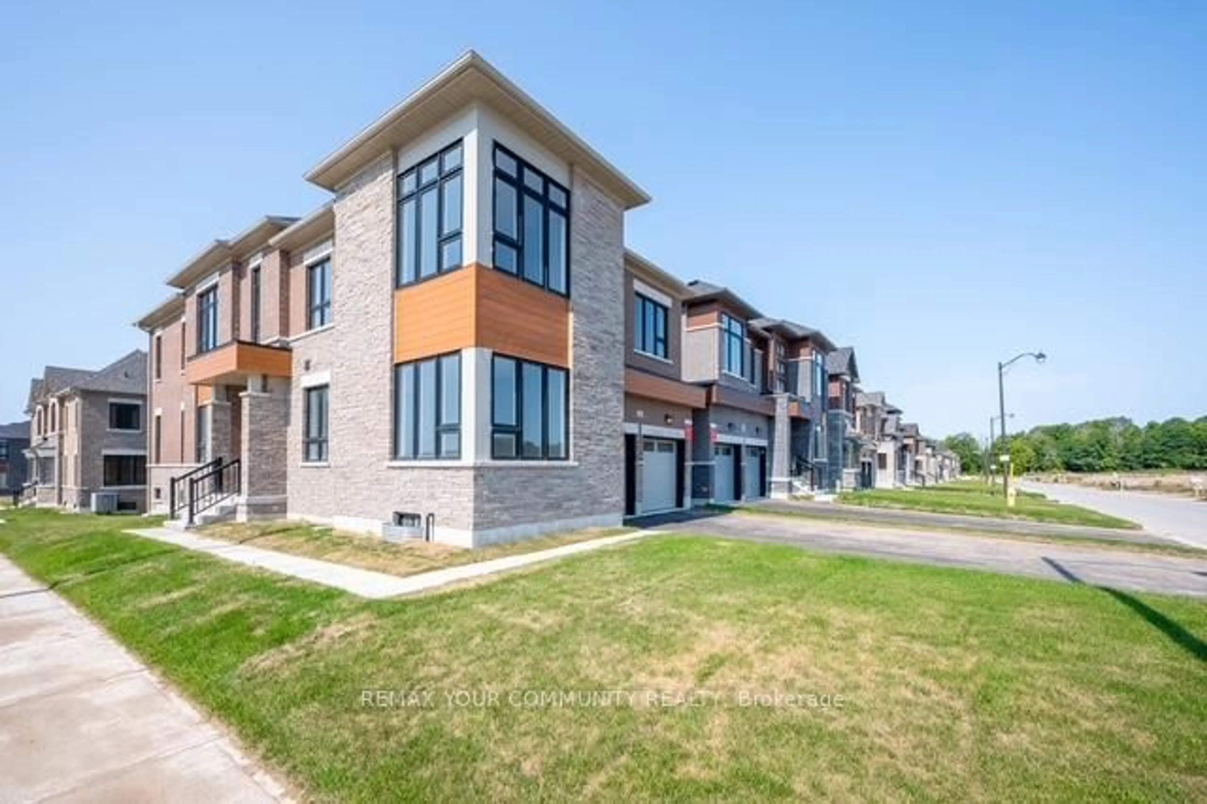 Home with brick exterior material, street for 44 Wild Ginger Lane, Springwater Ontario L9X 2C9