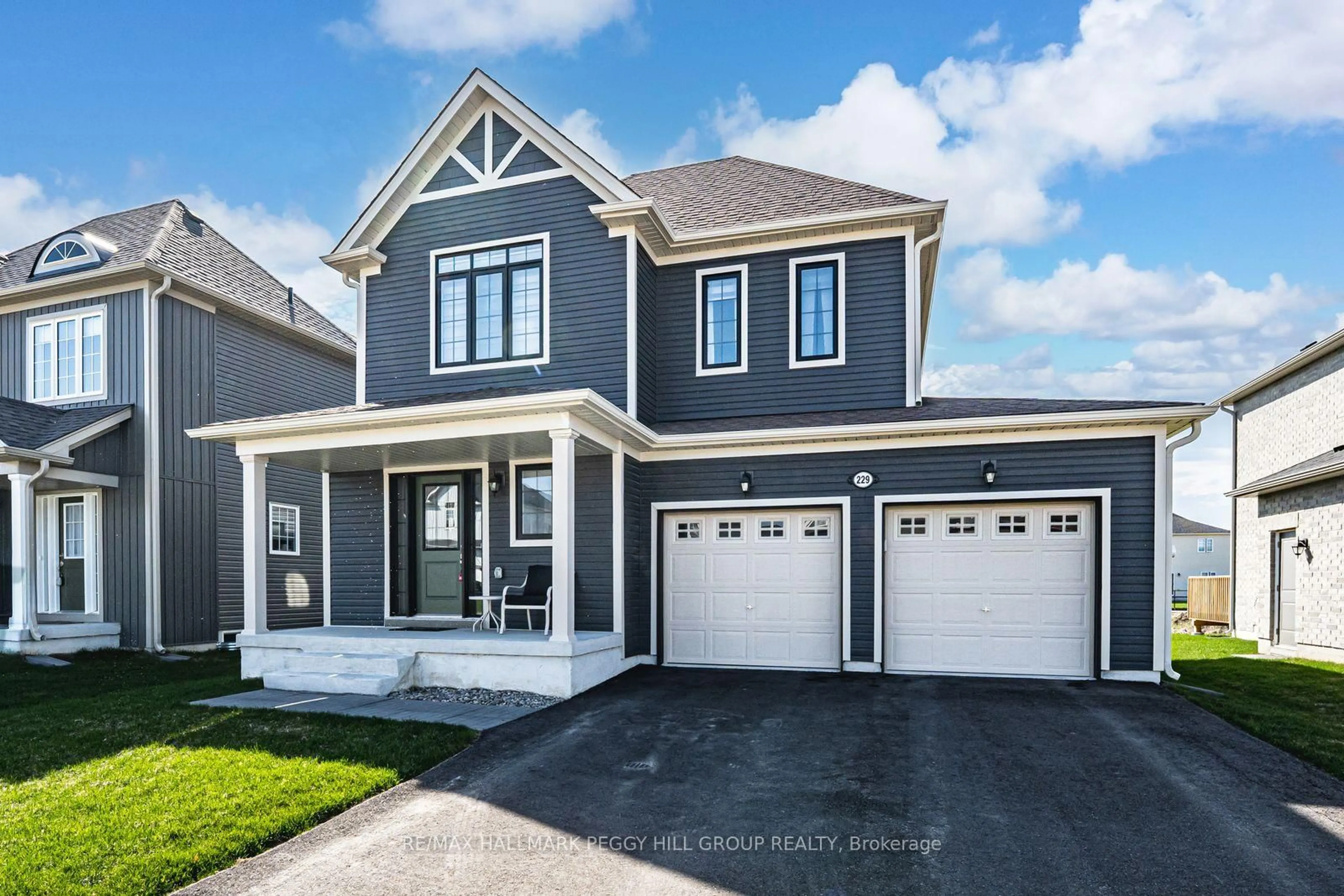 Home with vinyl exterior material, street for 229 Mckenzie Dr, Clearview Ontario L0M 1S0