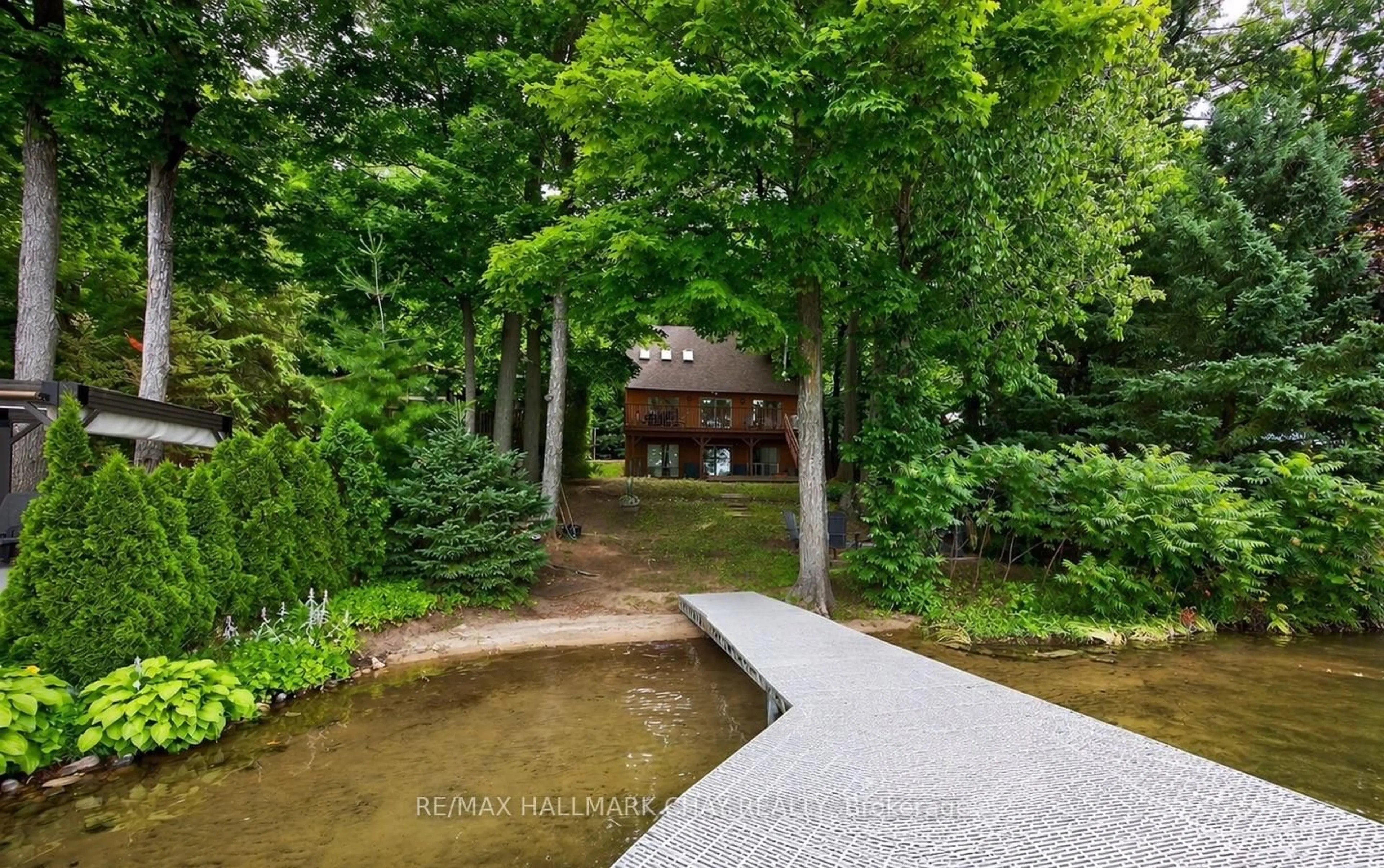 A pic from outside/outdoor area/front of a property/back of a property/a pic from drone, water/lake/river/ocean view for 176 Farlain Lake Rd, Tiny Ontario L9M 0B5