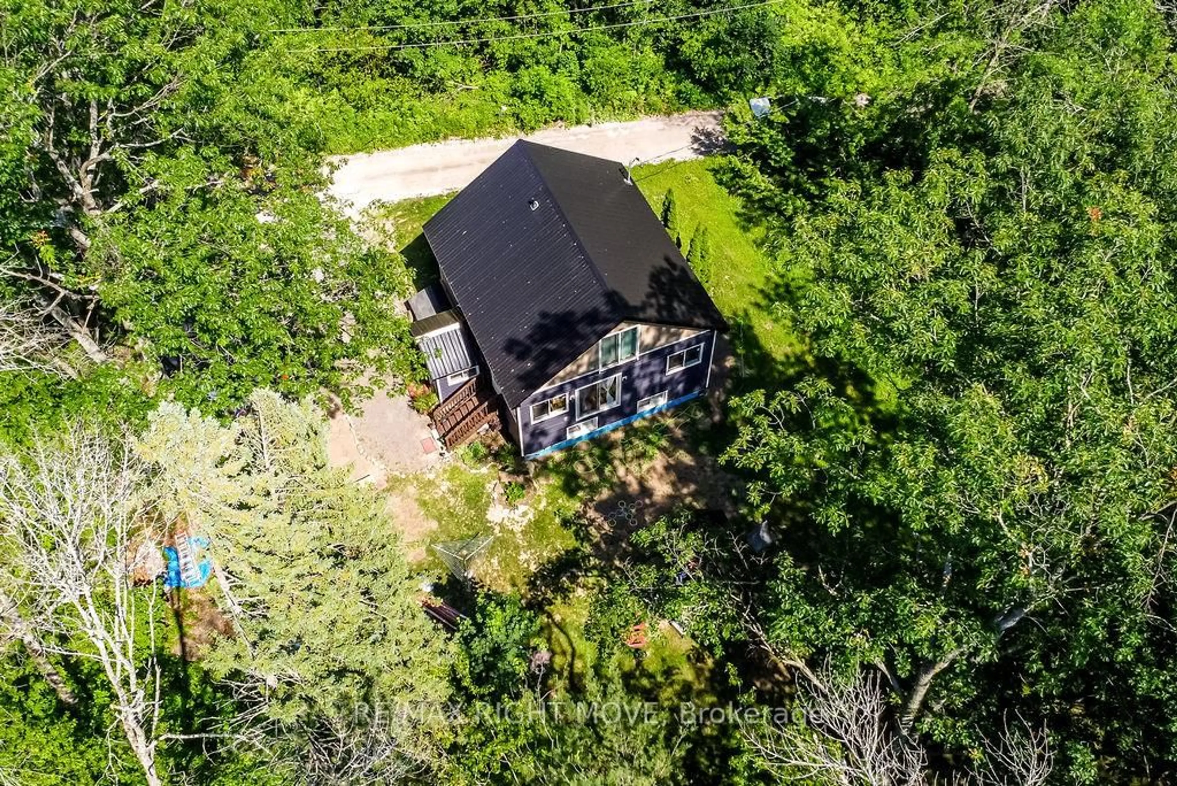 A pic from outside/outdoor area/front of a property/back of a property/a pic from drone, forest/trees view for 6896 Pentland Lane, Ramara Ontario L0K 2B0