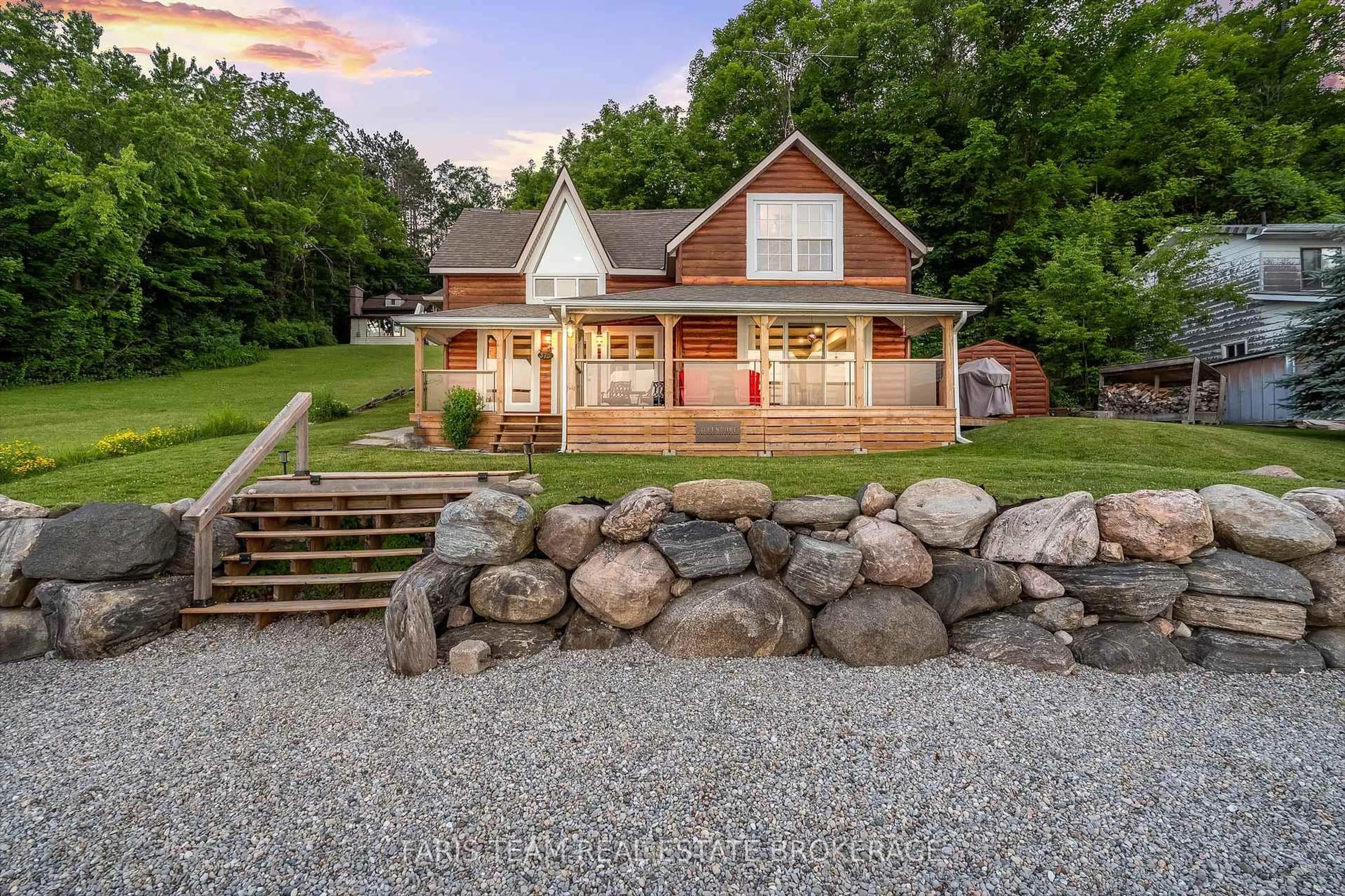 A pic from outside/outdoor area/front of a property/back of a property/a pic from drone, water/lake/river/ocean view for 375 Champlain Rd, Penetanguishene Ontario L9M 1S3