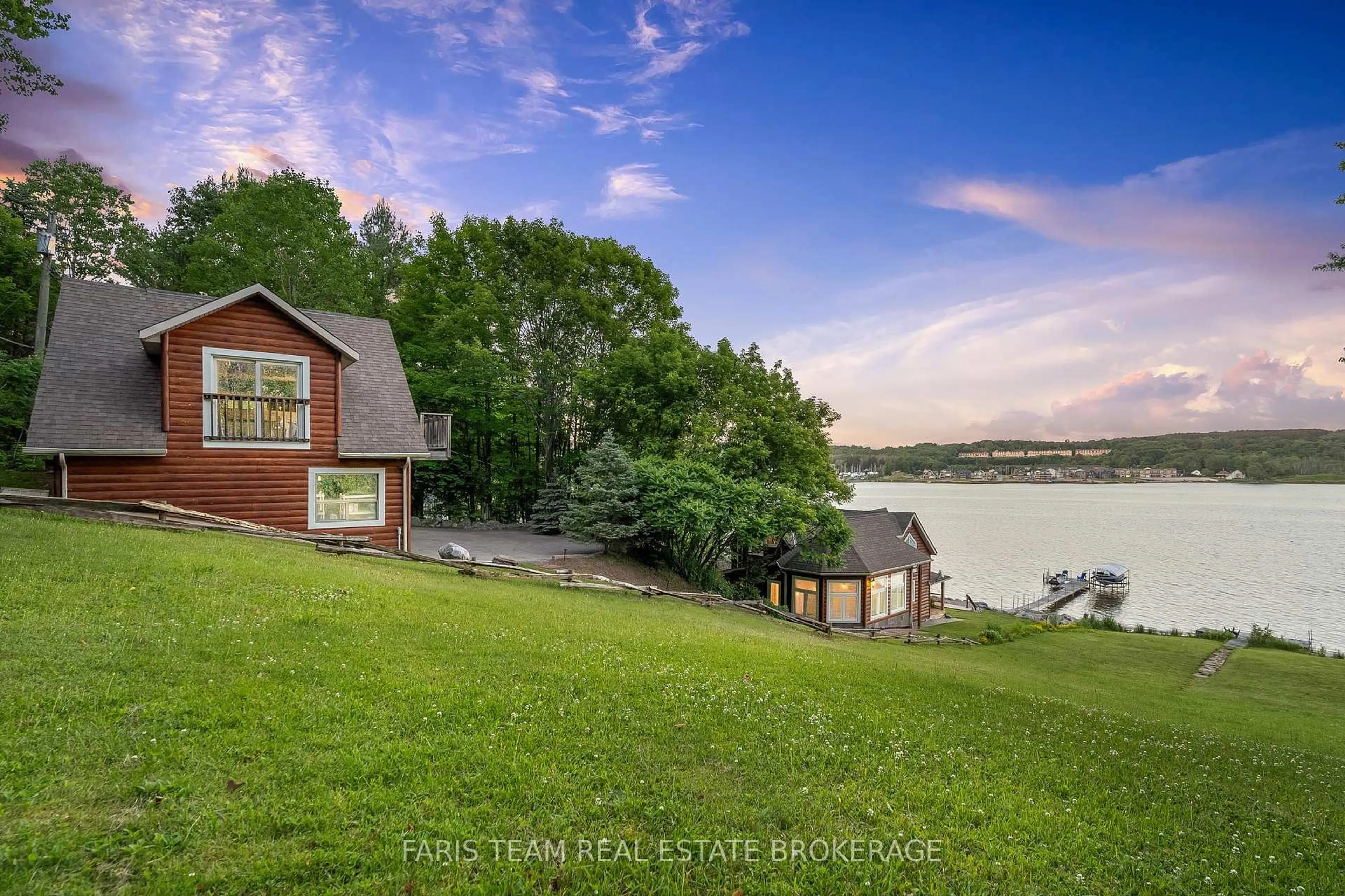 A pic from outside/outdoor area/front of a property/back of a property/a pic from drone, water/lake/river/ocean view for 375 Champlain Rd, Penetanguishene Ontario L9M 1S3
