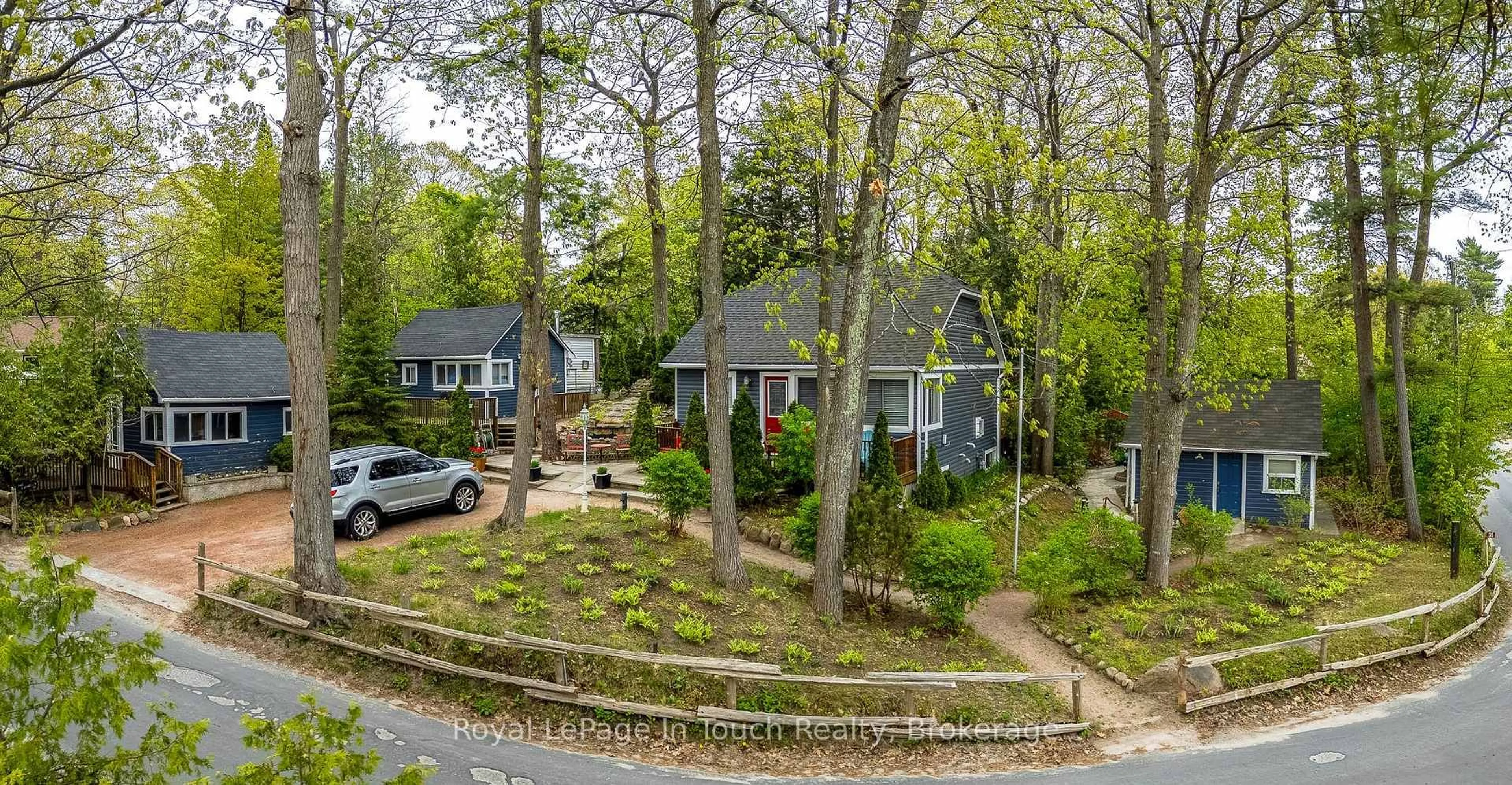 A pic from outside/outdoor area/front of a property/back of a property/a pic from drone, street for 35 Tiny Beaches Rd, Tiny Ontario L0L 2J0