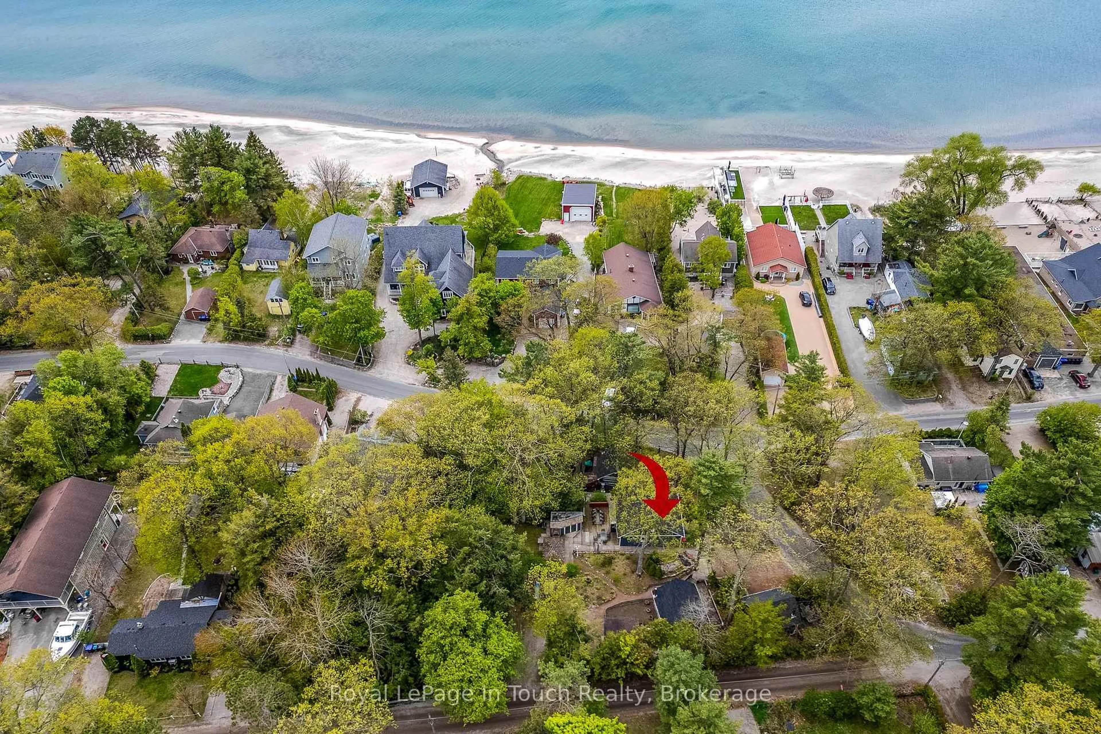 A pic from outside/outdoor area/front of a property/back of a property/a pic from drone, water/lake/river/ocean view for 35 Tiny Beaches Rd, Tiny Ontario L0L 2J0