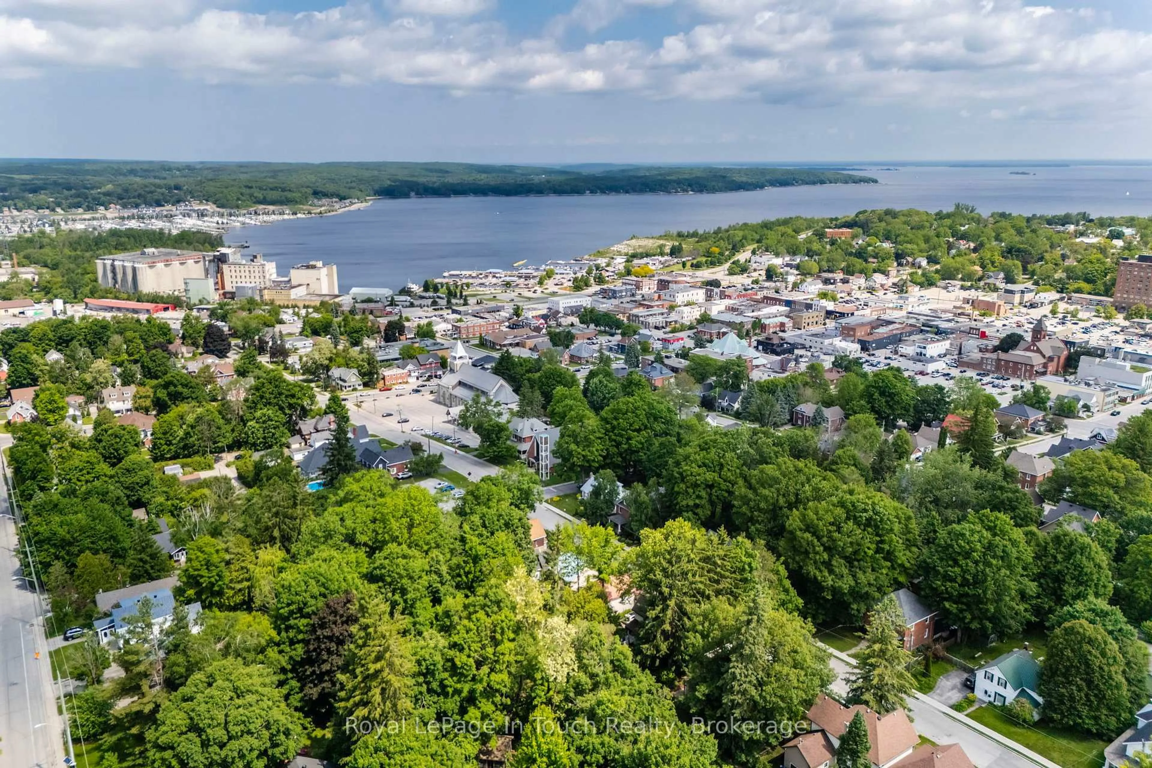 A pic from outside/outdoor area/front of a property/back of a property/a pic from drone, water/lake/river/ocean view for 330 Third St, Midland Ontario L4R 3S7