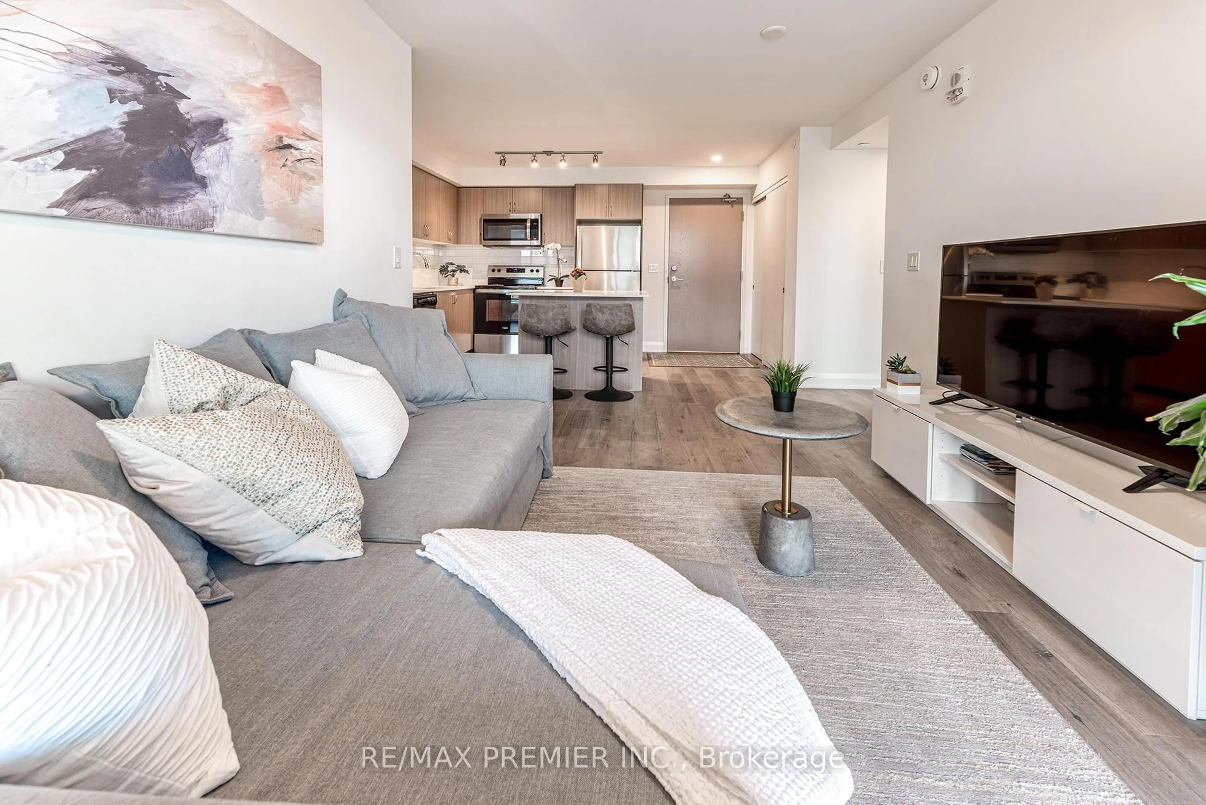 Living room with furniture, unknown for 58 Lakeside Terr #908, Barrie Ontario L4M 0L5