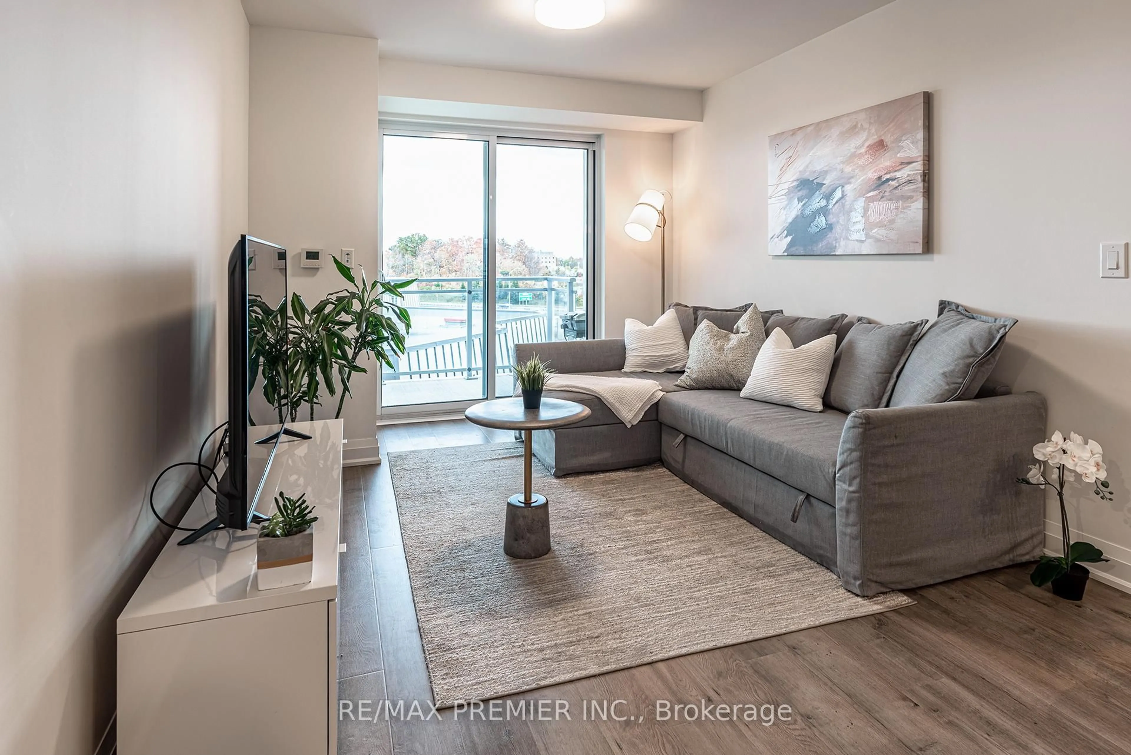 Living room with furniture, unknown for 58 Lakeside Terr #908, Barrie Ontario L4M 0L5