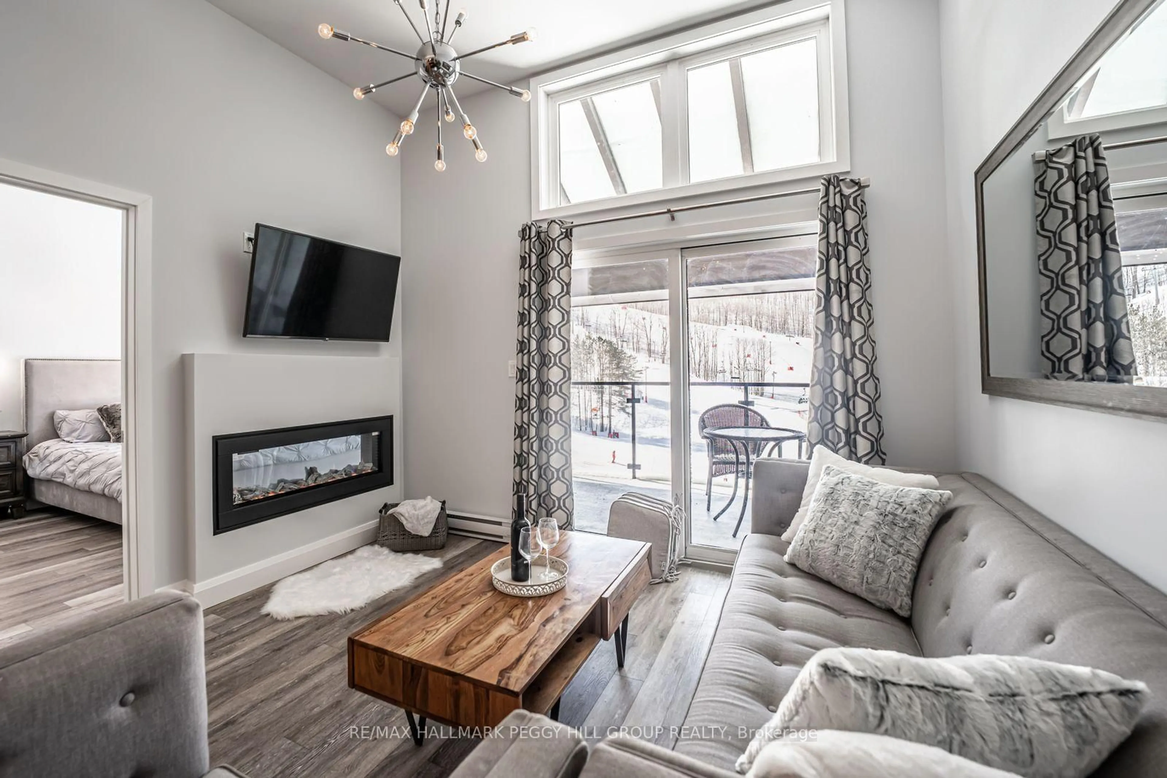 Living room with furniture, unknown for 80 Horseshoe Blvd #503, Oro-Medonte Ontario L4M 4Y8