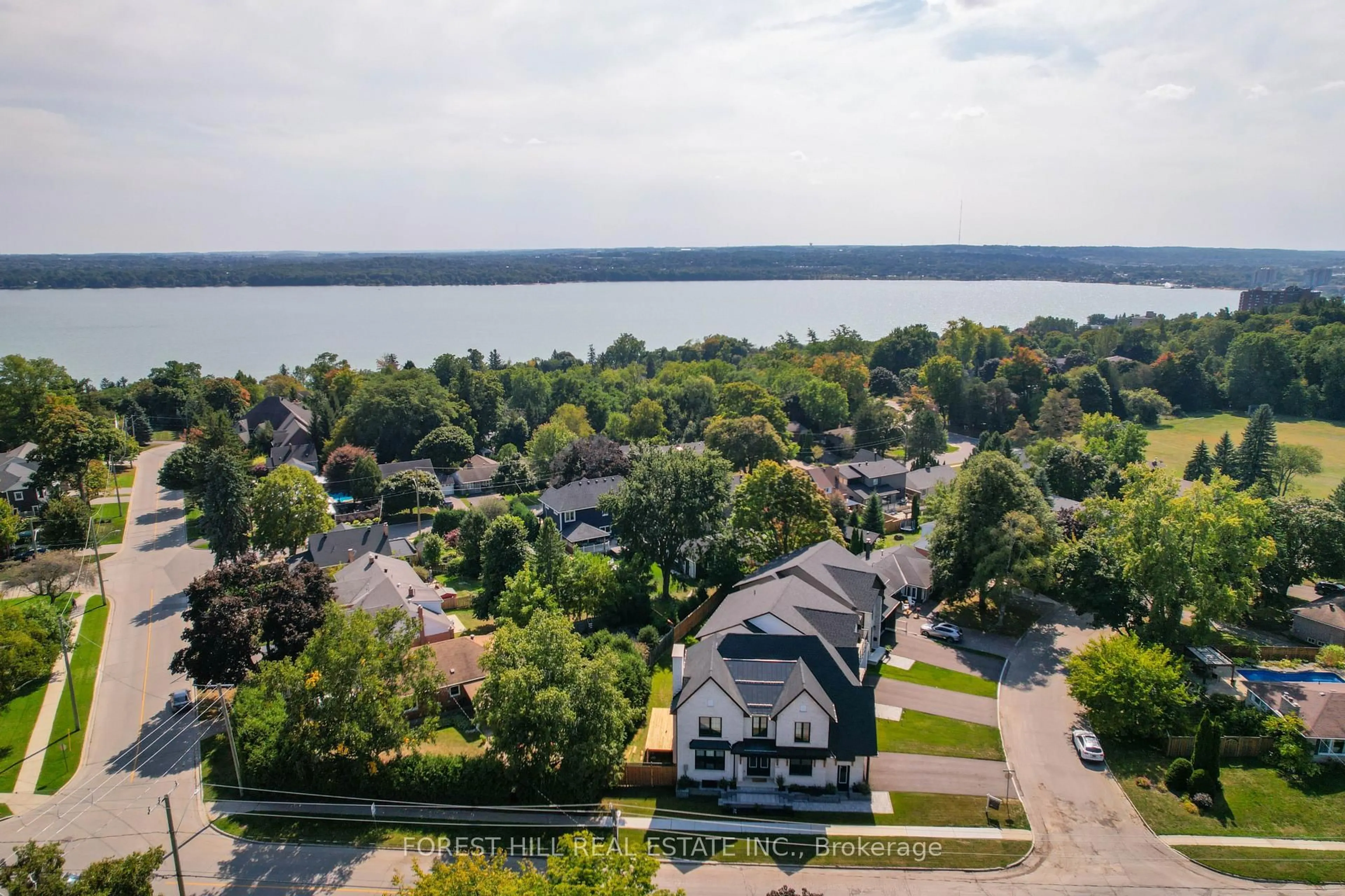 A pic from outside/outdoor area/front of a property/back of a property/a pic from drone, water/lake/river/ocean view for 271 Codrington St, Barrie Ontario L4M 1S7