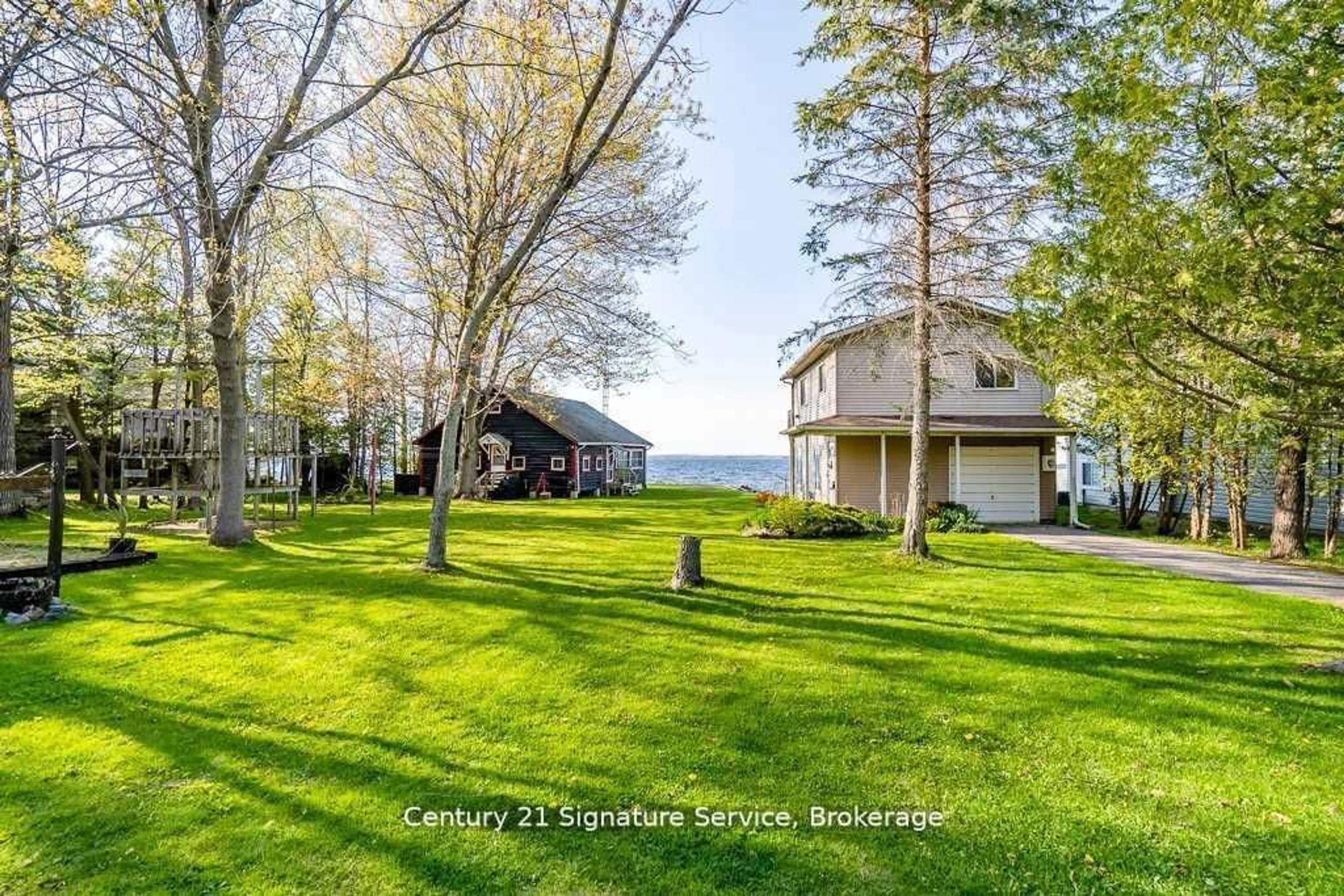 A pic from outside/outdoor area/front of a property/back of a property/a pic from drone, water/lake/river/ocean view for 264 Robins Point Rd, Tay Ontario L0K 2A0