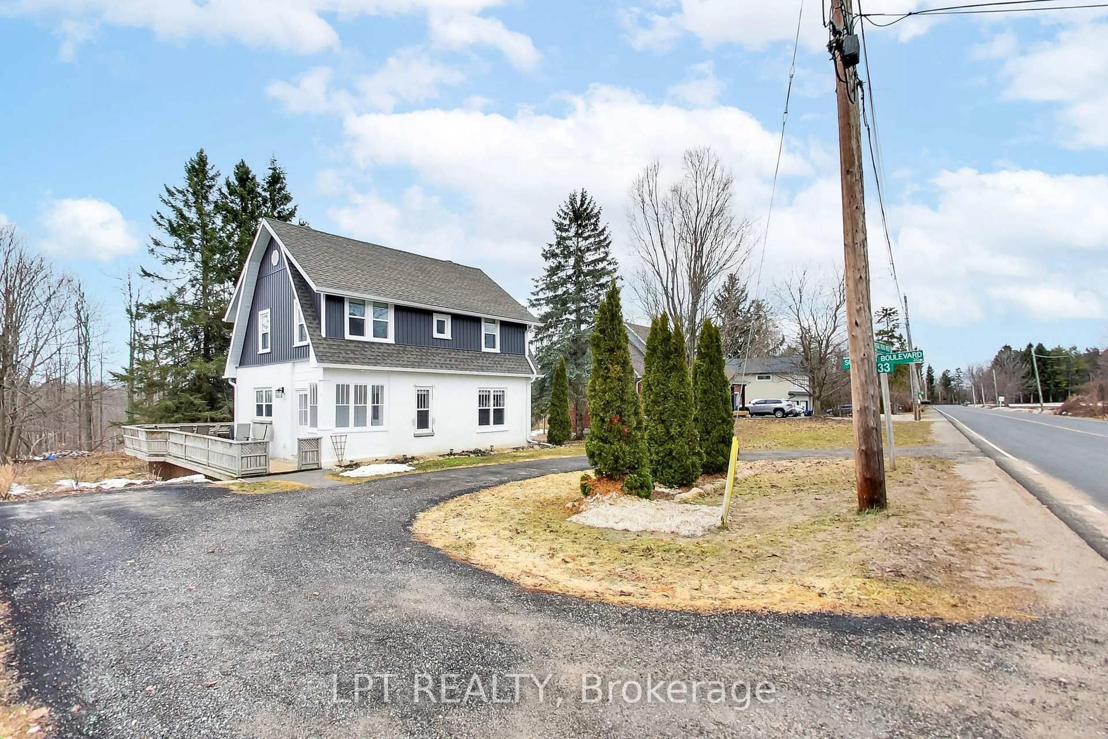A pic from outside/outdoor area/front of a property/back of a property/a pic from drone, street for 33 Ridge Rd, Oro-Medonte Ontario L0L 2E0