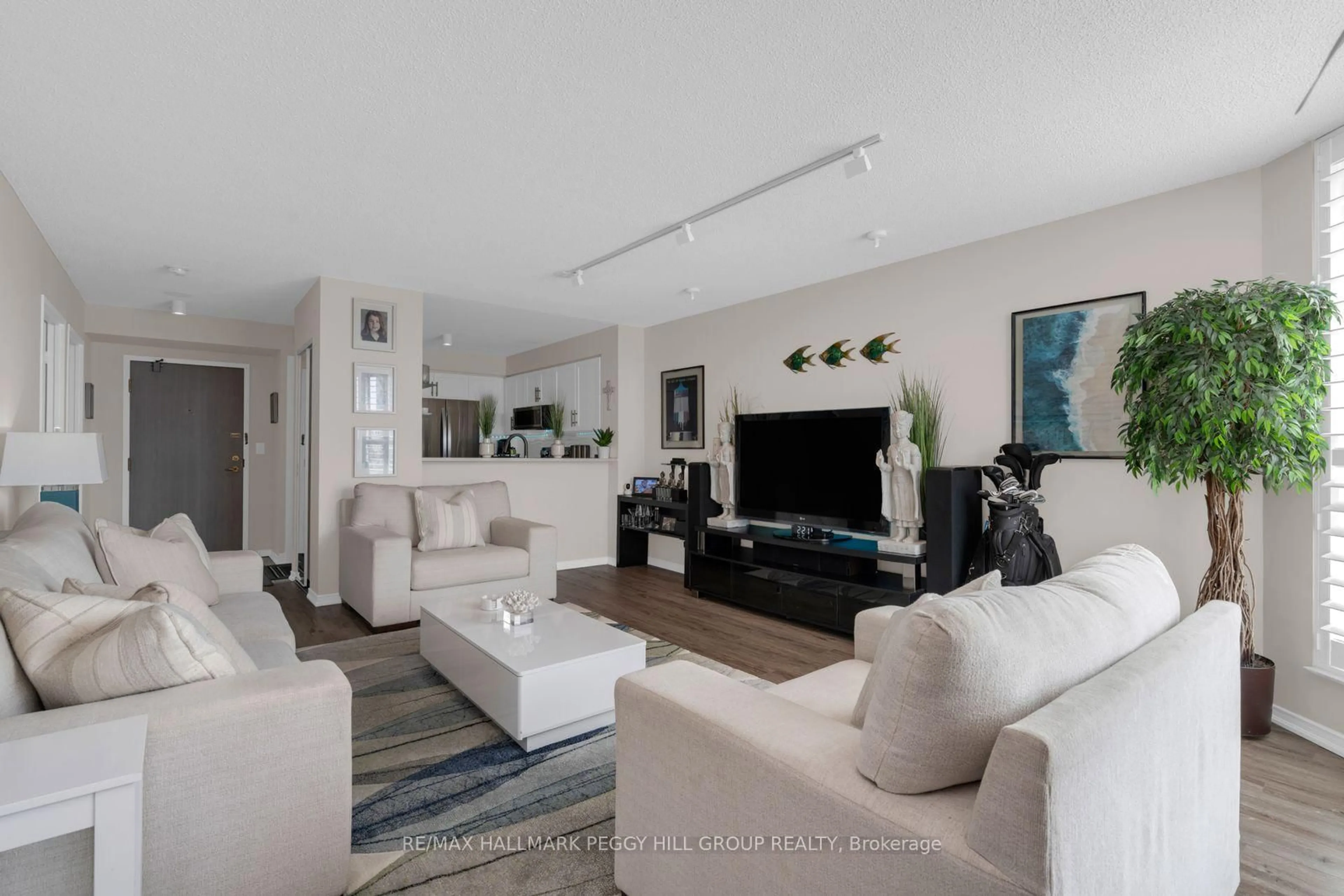 Living room with furniture, unknown for 140 Dunlop St #505, Barrie Ontario L4M 6H9
