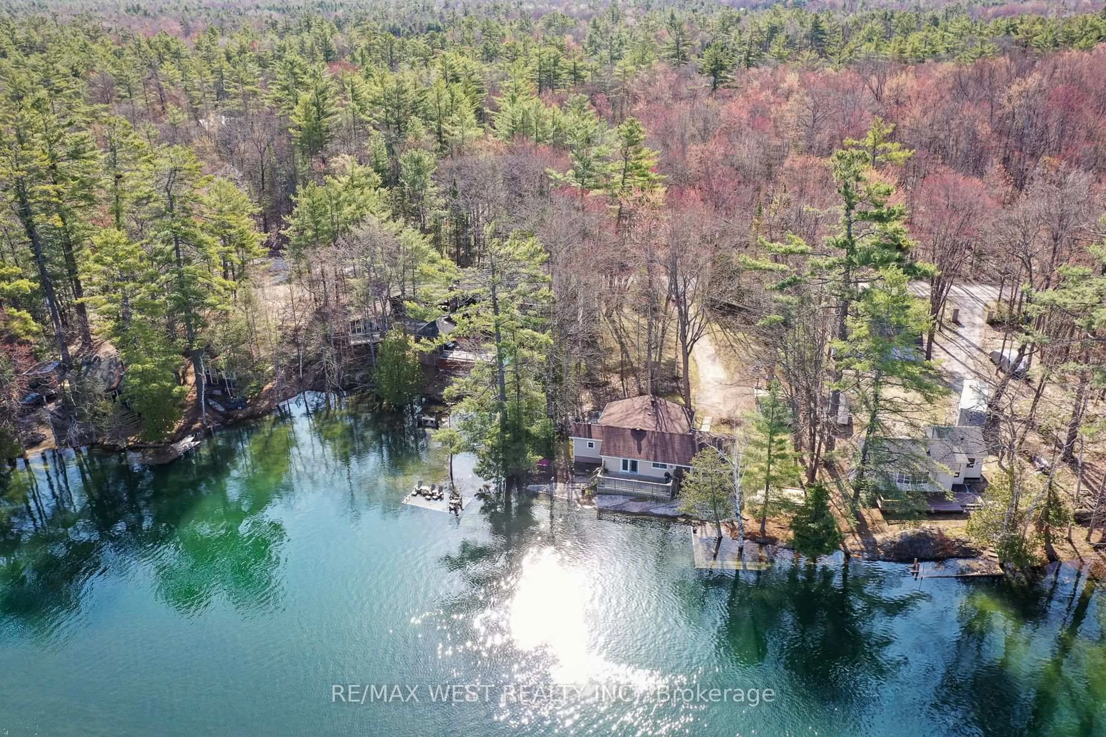 A pic from outside/outdoor area/front of a property/back of a property/a pic from drone, forest/trees view for 8060 Oakridge Dr, Ramara Ontario L0K 2B0
