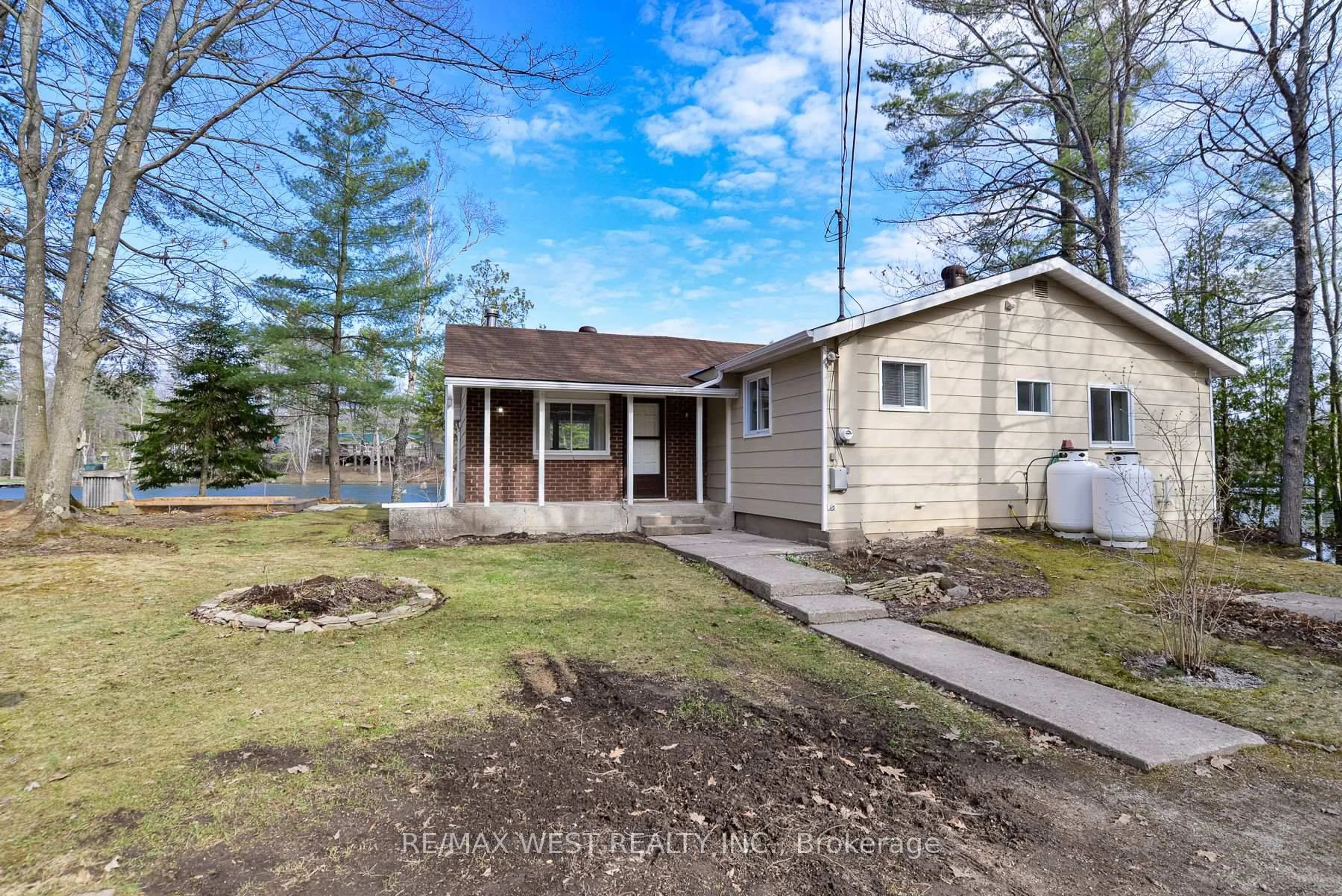 A pic from outside/outdoor area/front of a property/back of a property/a pic from drone, street for 8060 Oakridge Dr, Ramara Ontario L0K 2B0