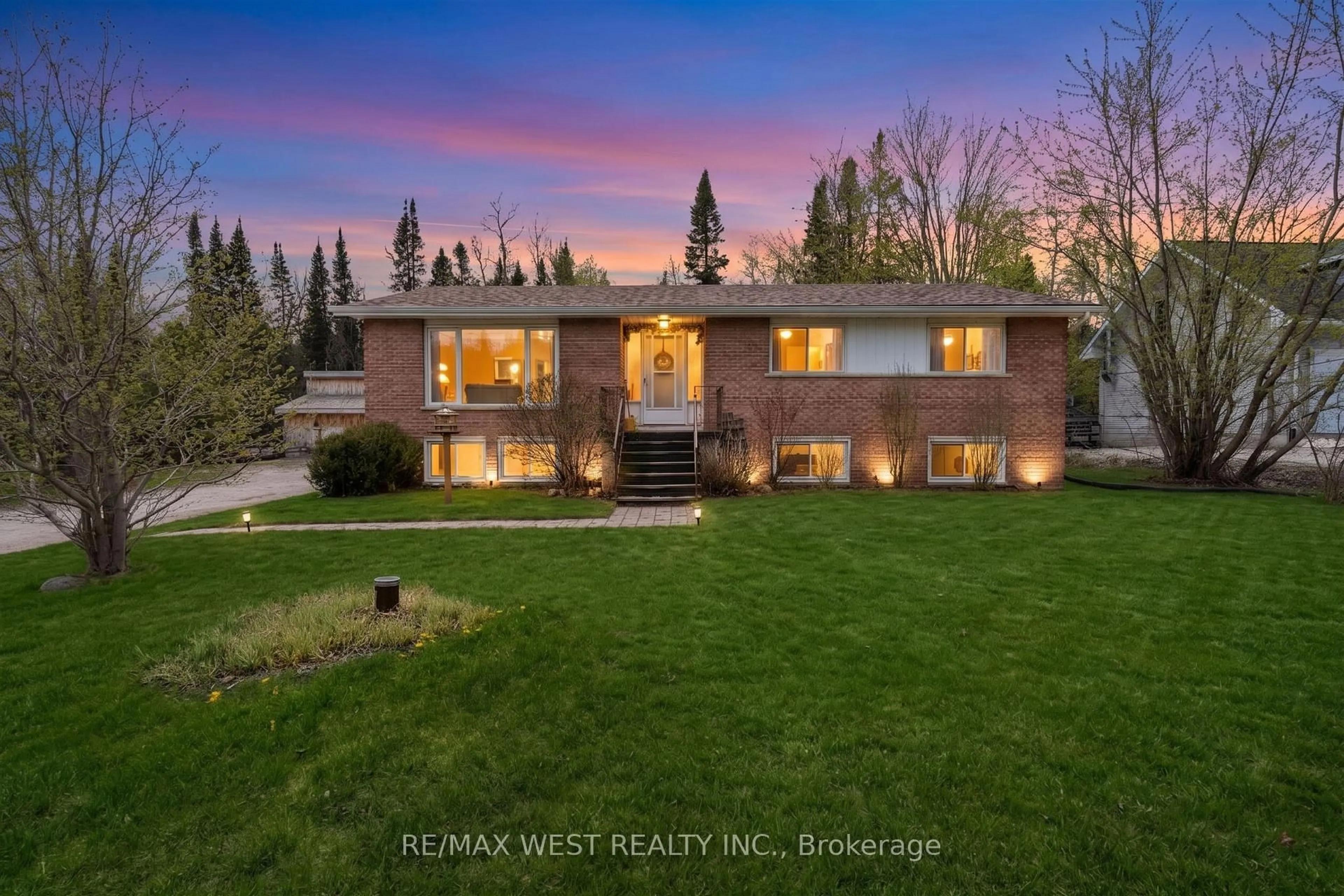 A pic from outside/outdoor area/front of a property/back of a property/a pic from drone, mountain view for 3768 George Johnston Rd, Springwater Ontario L4M 4S4