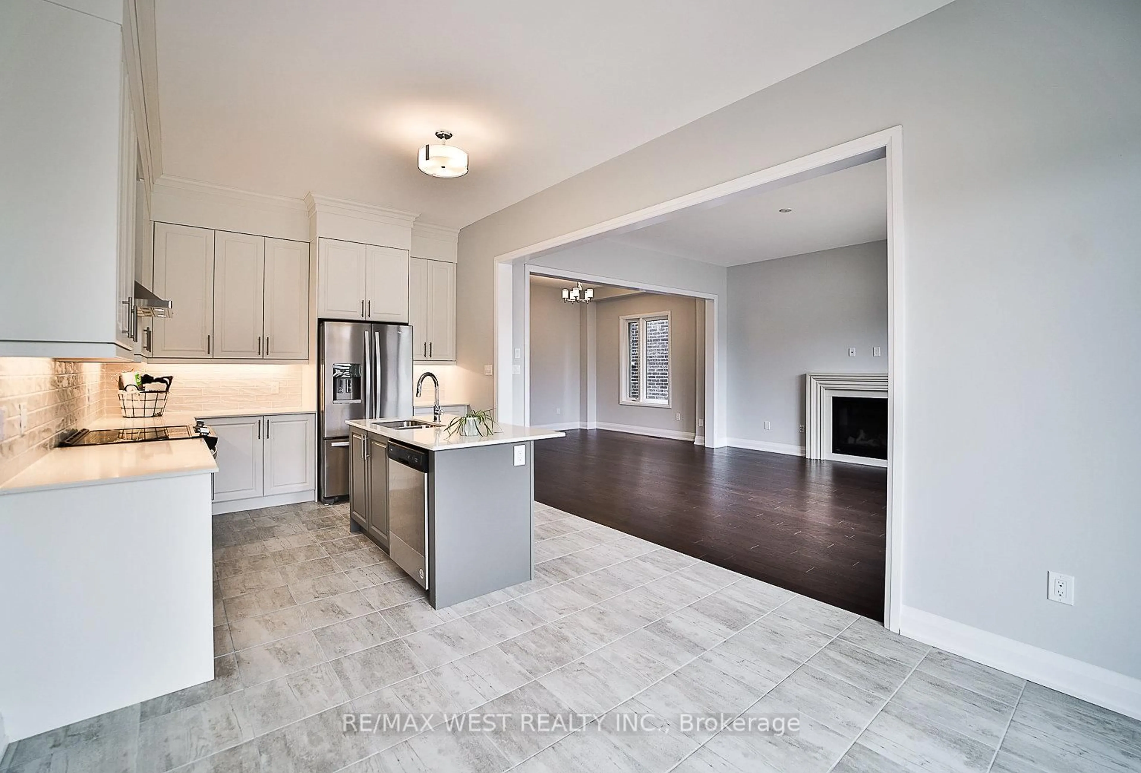 Open concept kitchen, ceramic/tile floor for 14 Periwinkle Rd, Springwater Ontario L0L 1Y3