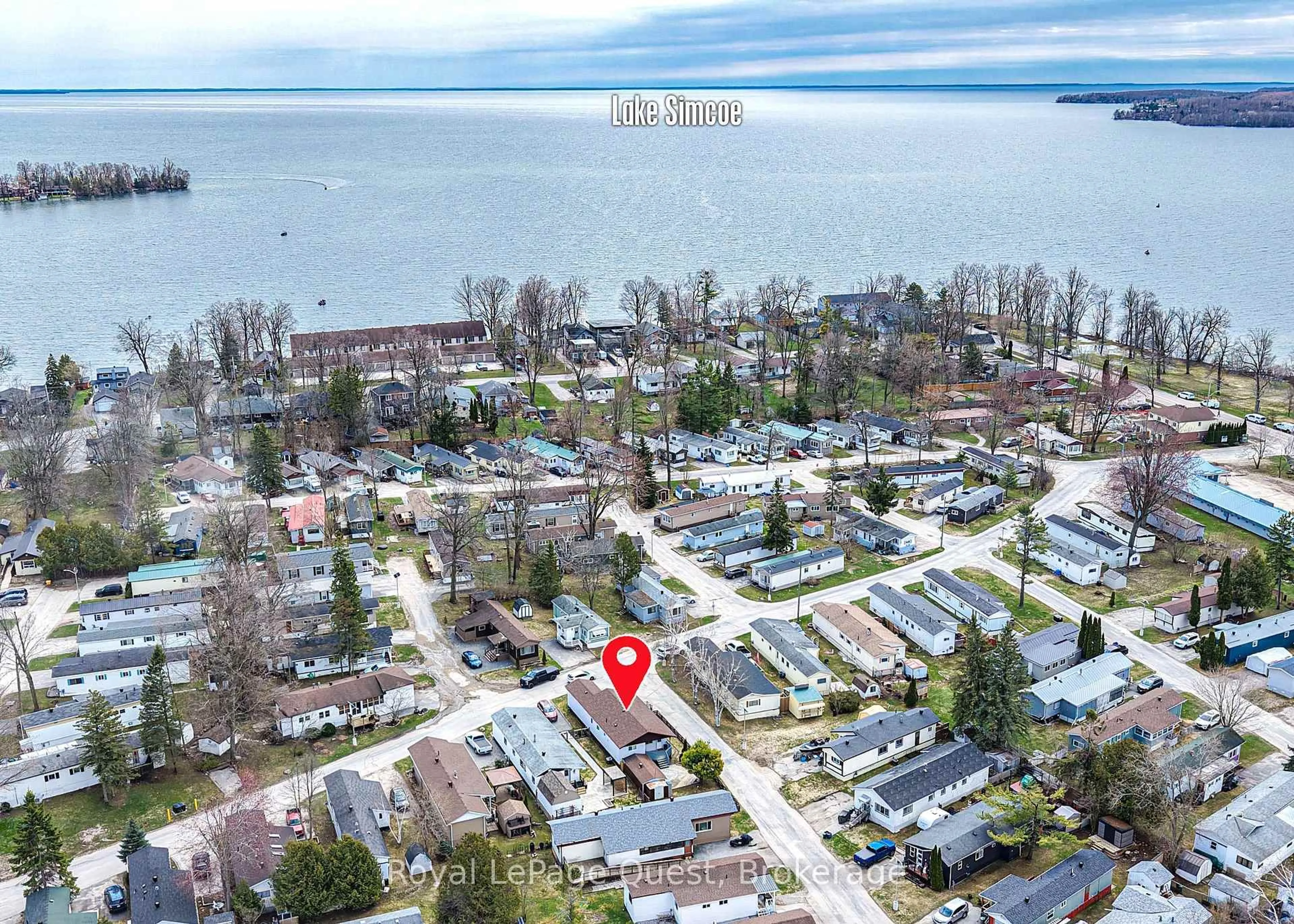 A pic from outside/outdoor area/front of a property/back of a property/a pic from drone, water/lake/river/ocean view for 580 West St #132, Orillia Ontario L3V 6L8