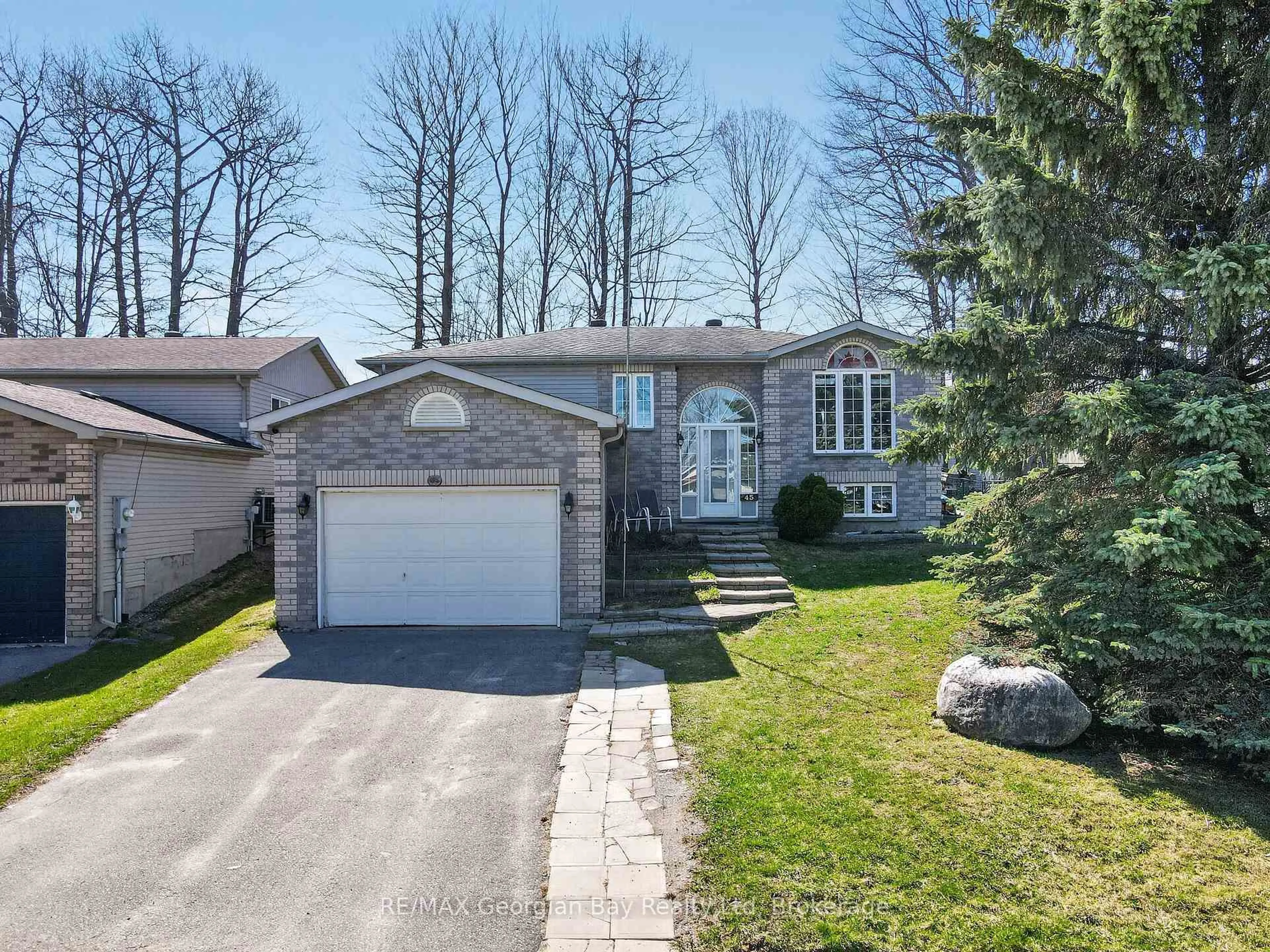 Home with brick exterior material, street for 45 Mcdermitt Tr, Tay Ontario L0K 2C0