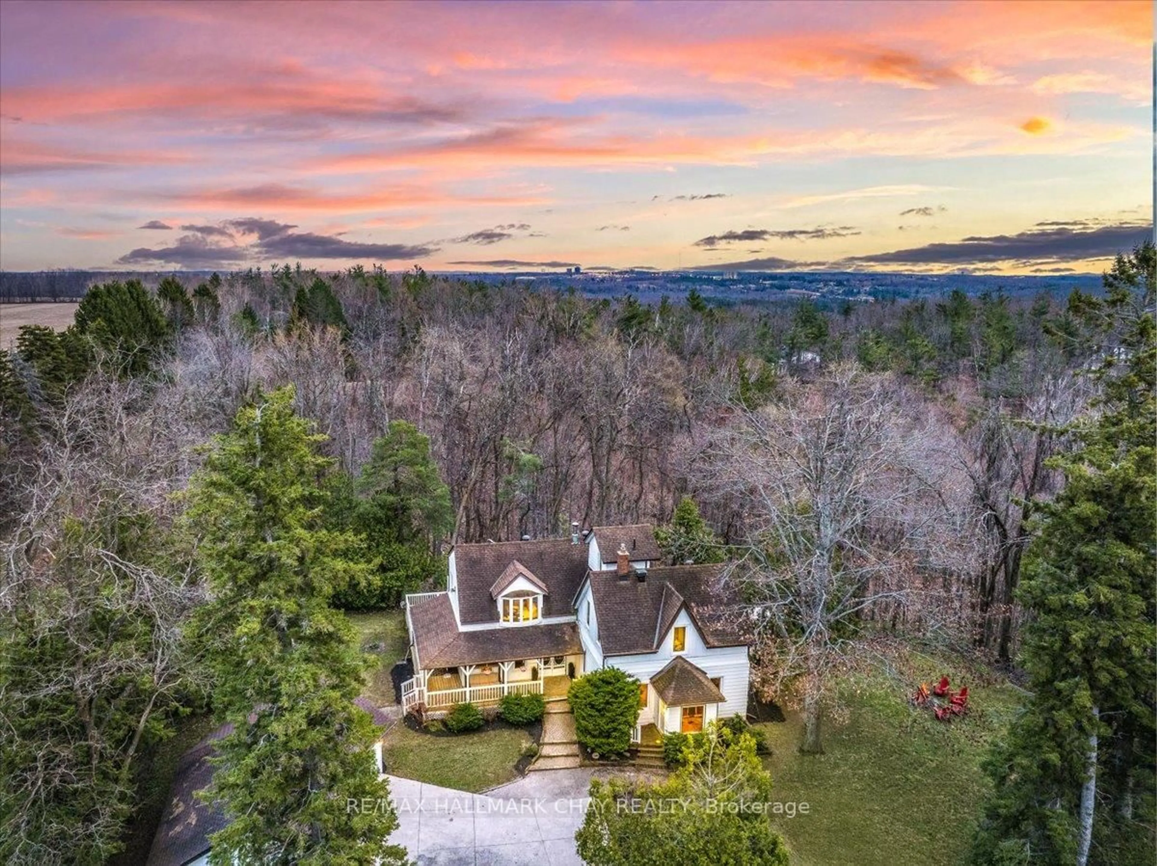 A pic from outside/outdoor area/front of a property/back of a property/a pic from drone, mountain view for 115 Doran Rd, Springwater Ontario L9X 1L5