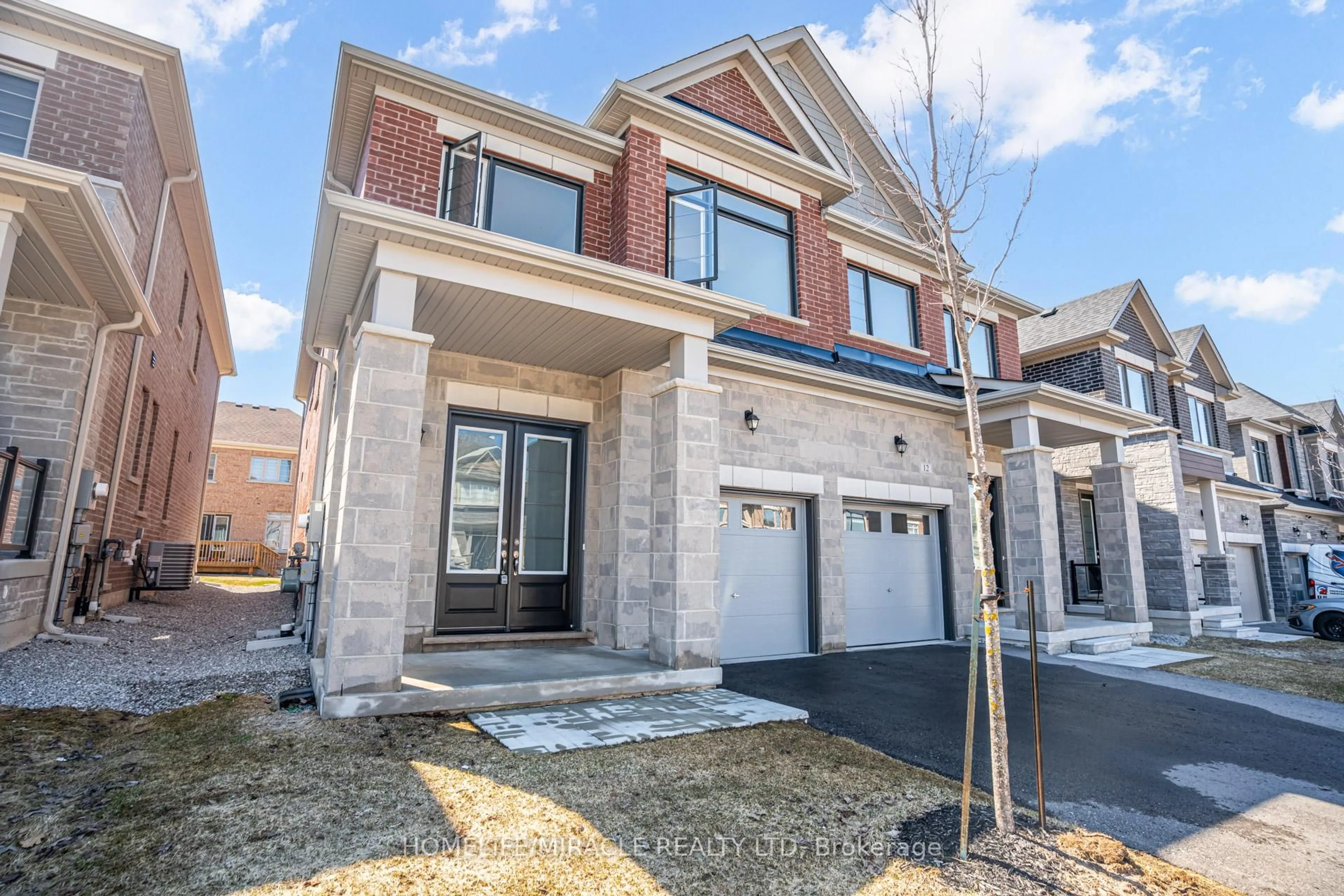 Home with brick exterior material, street for 14 Sassafras Rd, Springwater Ontario L9X 2C6