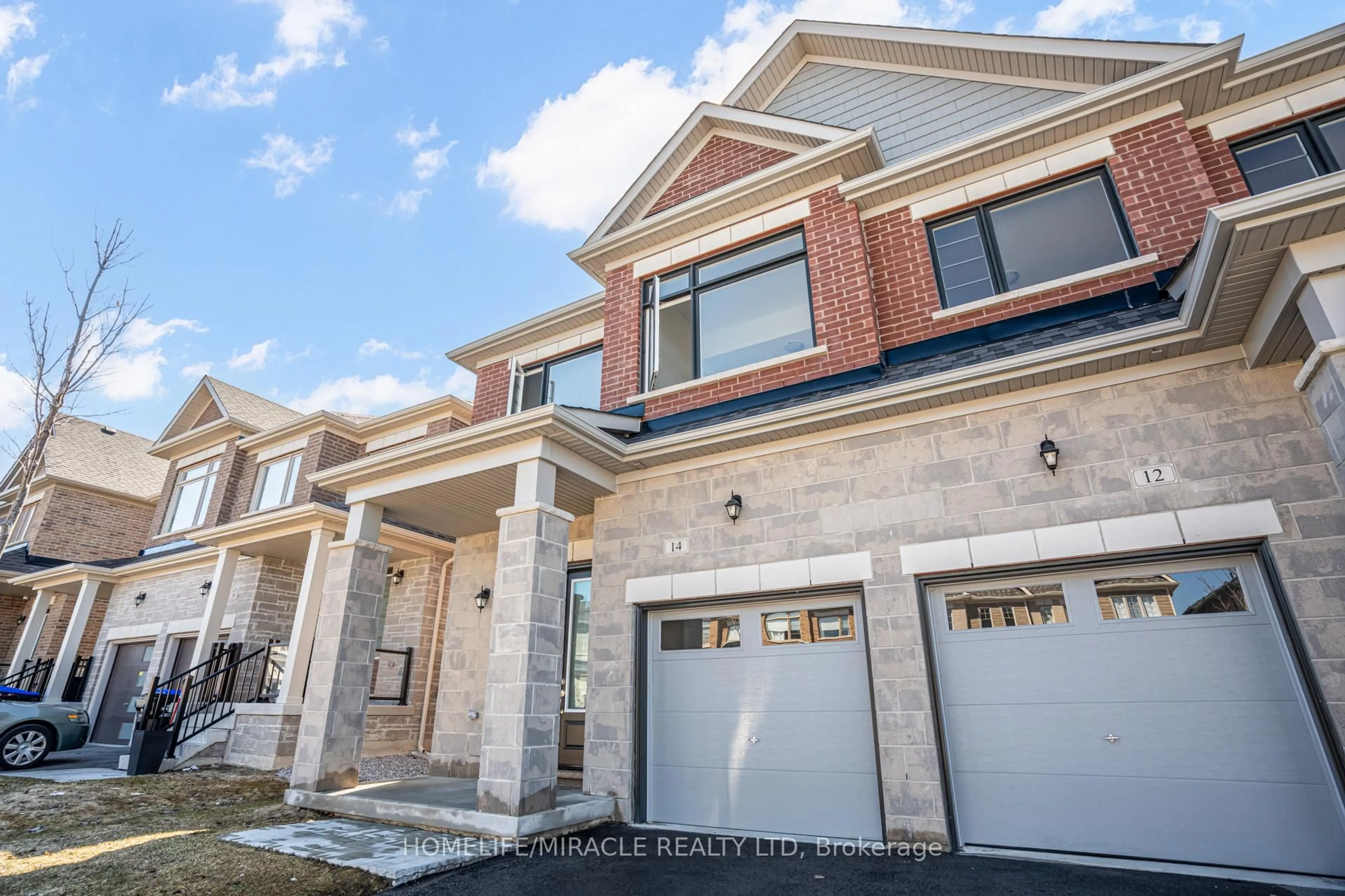 Home with brick exterior material, street for 14 Sassafras Rd, Springwater Ontario L9X 2C6