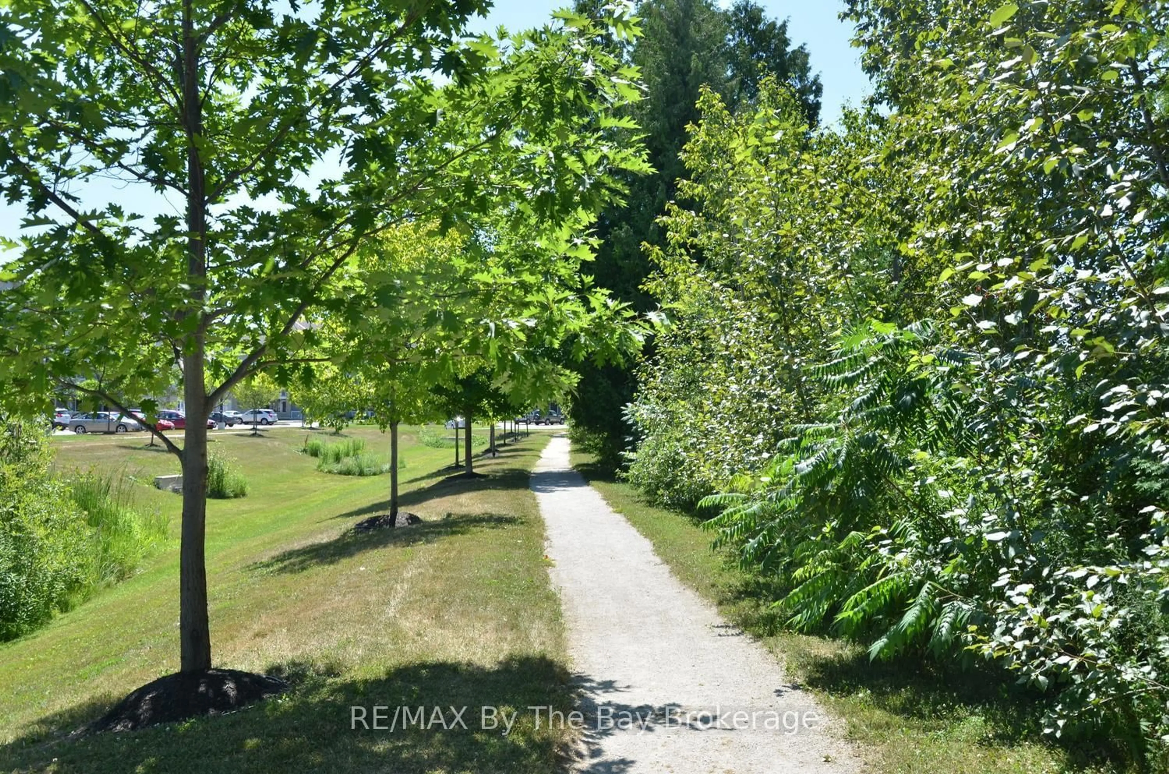 A pic from outside/outdoor area/front of a property/back of a property/a pic from drone, forest/trees view for 40 Mulligan Lane #208, Wasaga Beach Ontario L9Z 0C5
