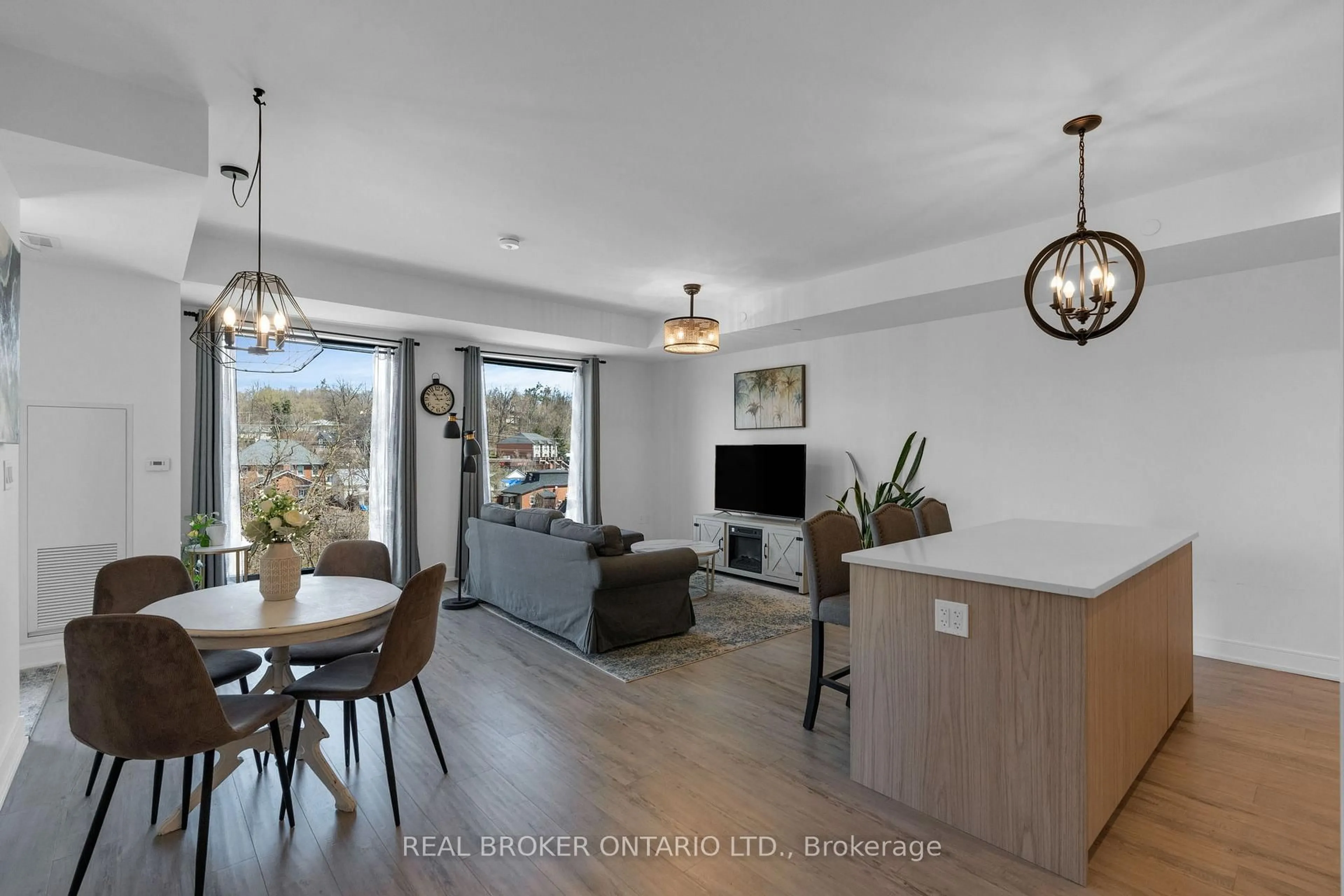 Open concept kitchen, wood/laminate floor for 185 Dunlop St #615, Barrie Ontario L4M 0L7