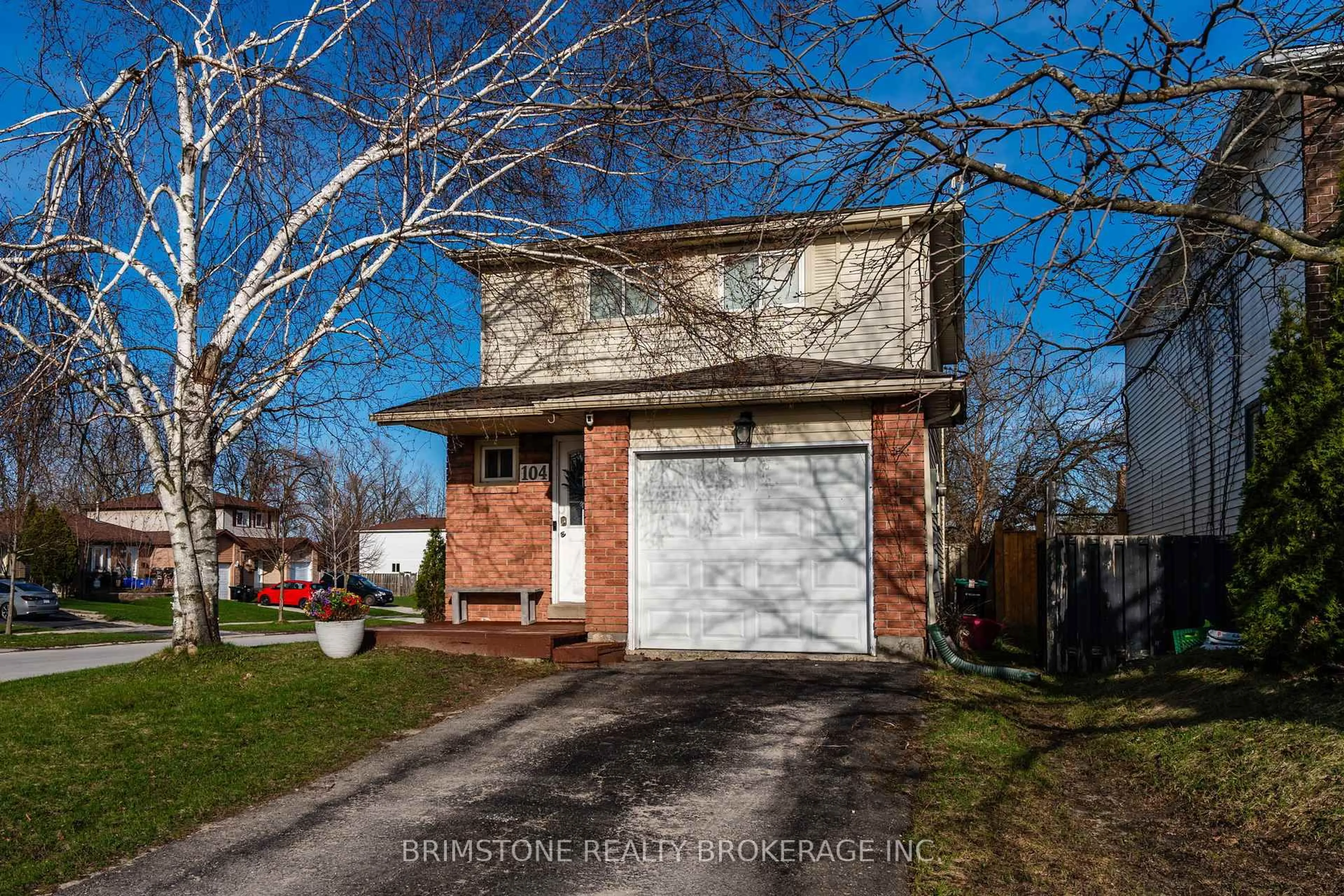 Home with brick exterior material, street for 104 Hickling Tr, Barrie Ontario L4M 5T4