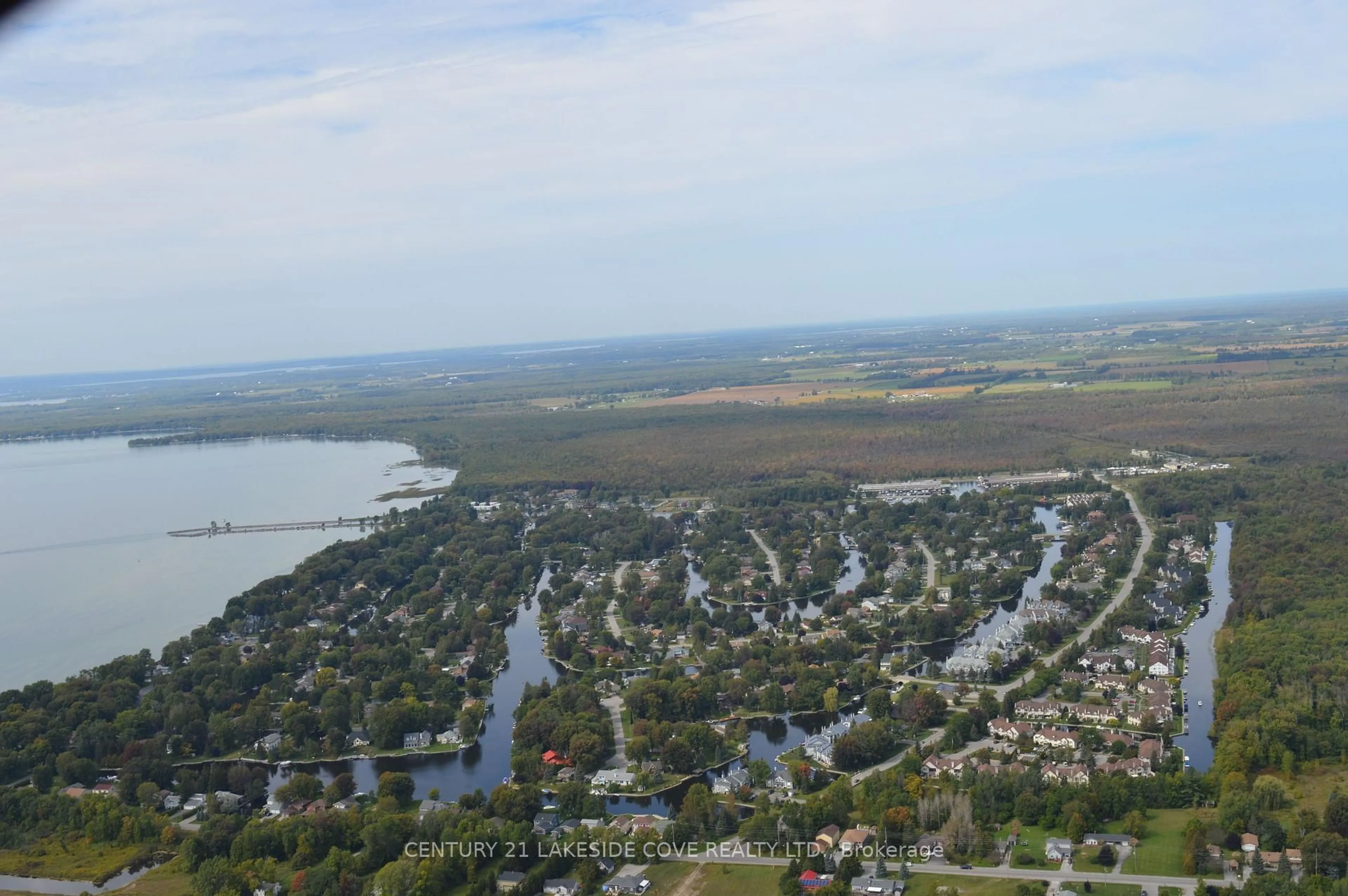 A pic from outside/outdoor area/front of a property/back of a property/a pic from drone, water/lake/river/ocean view for 71 Laguna Pkwy #Unit 19, Ramara Ontario L0K 1B0