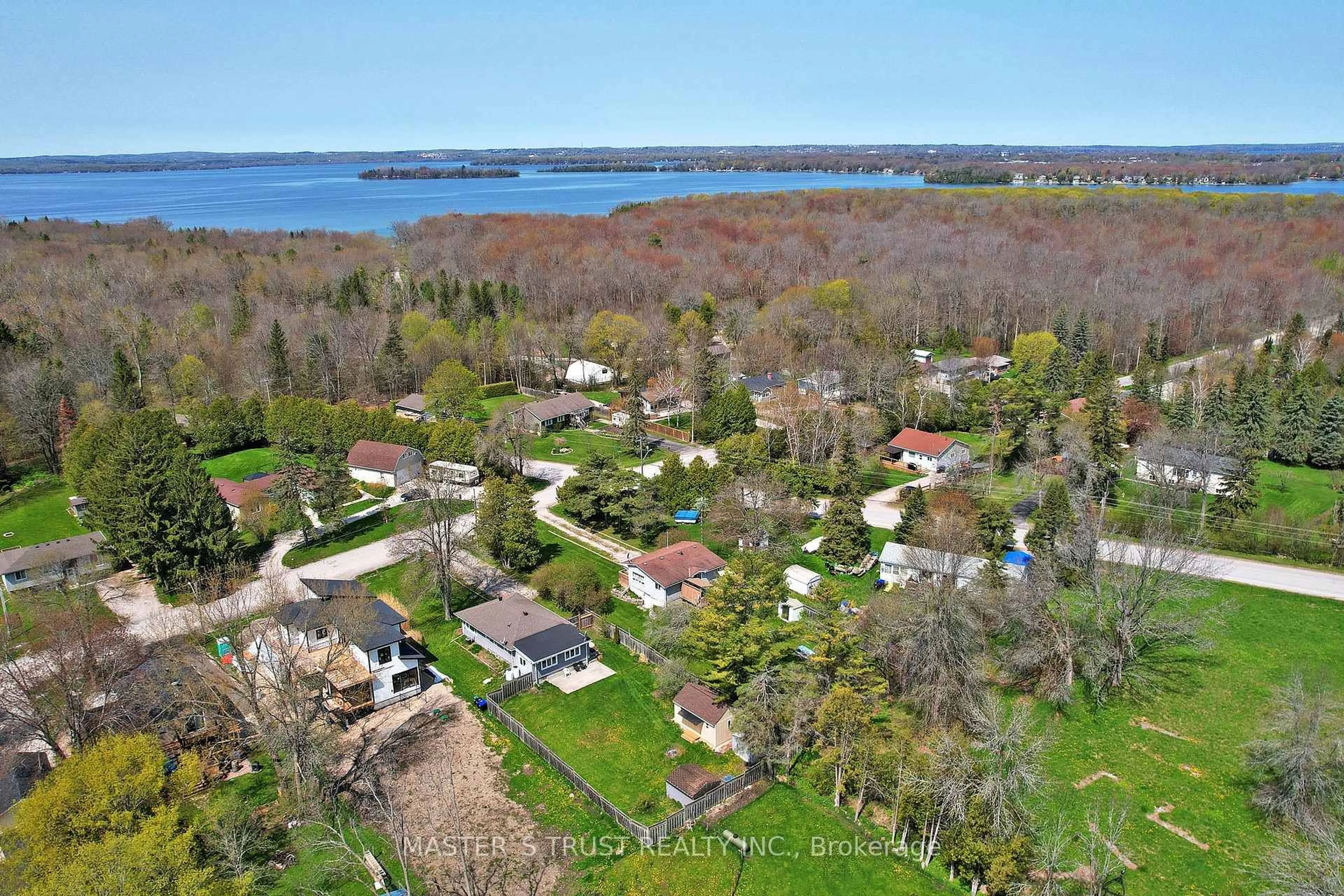 A pic from outside/outdoor area/front of a property/back of a property/a pic from drone, water/lake/river/ocean view for 3965 Hilltop Rd, Ramara Ontario L3V 6H7