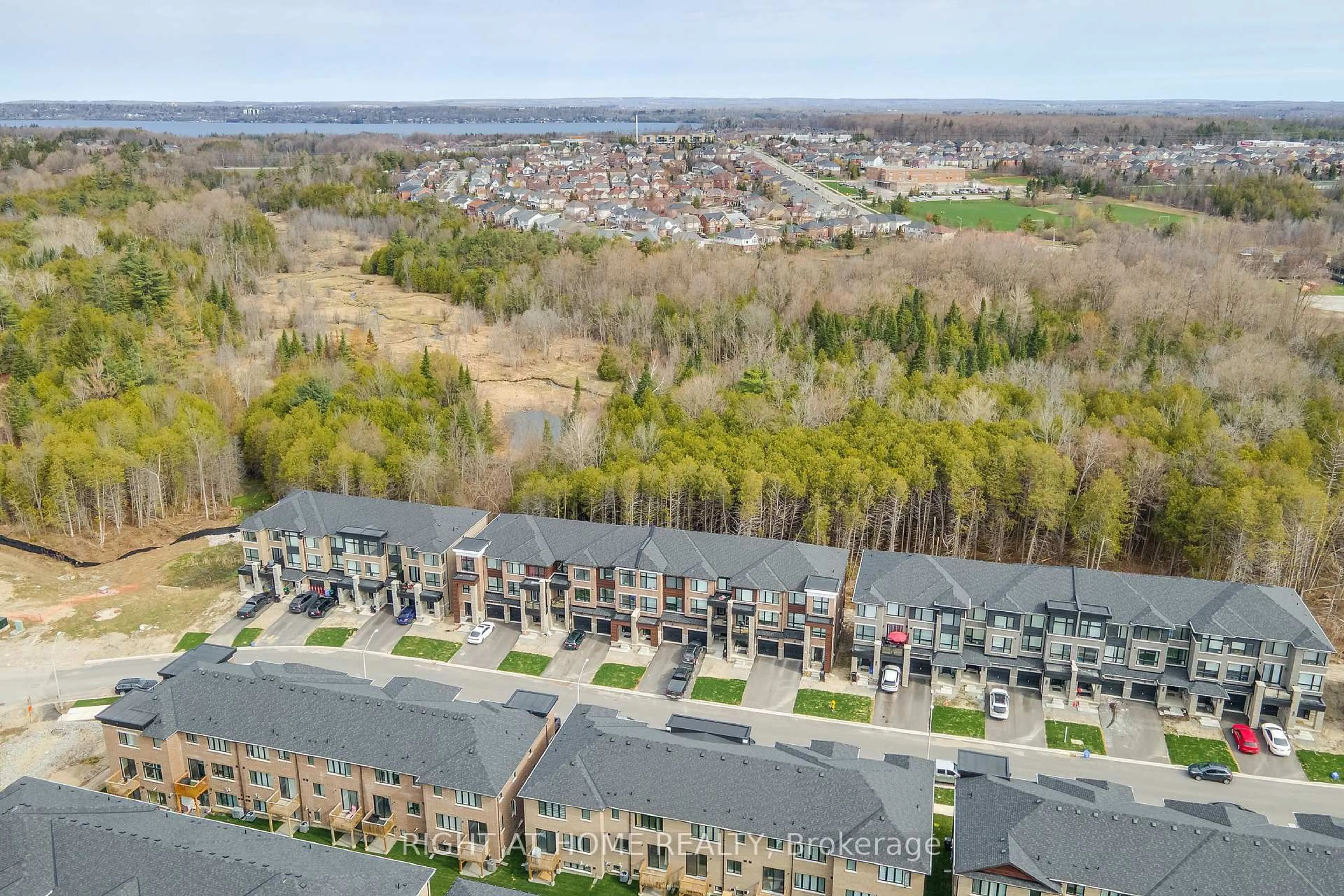 A pic from outside/outdoor area/front of a property/back of a property/a pic from drone, unknown for 132 Blue Forest Cres, Barrie Ontario L4M 7J6