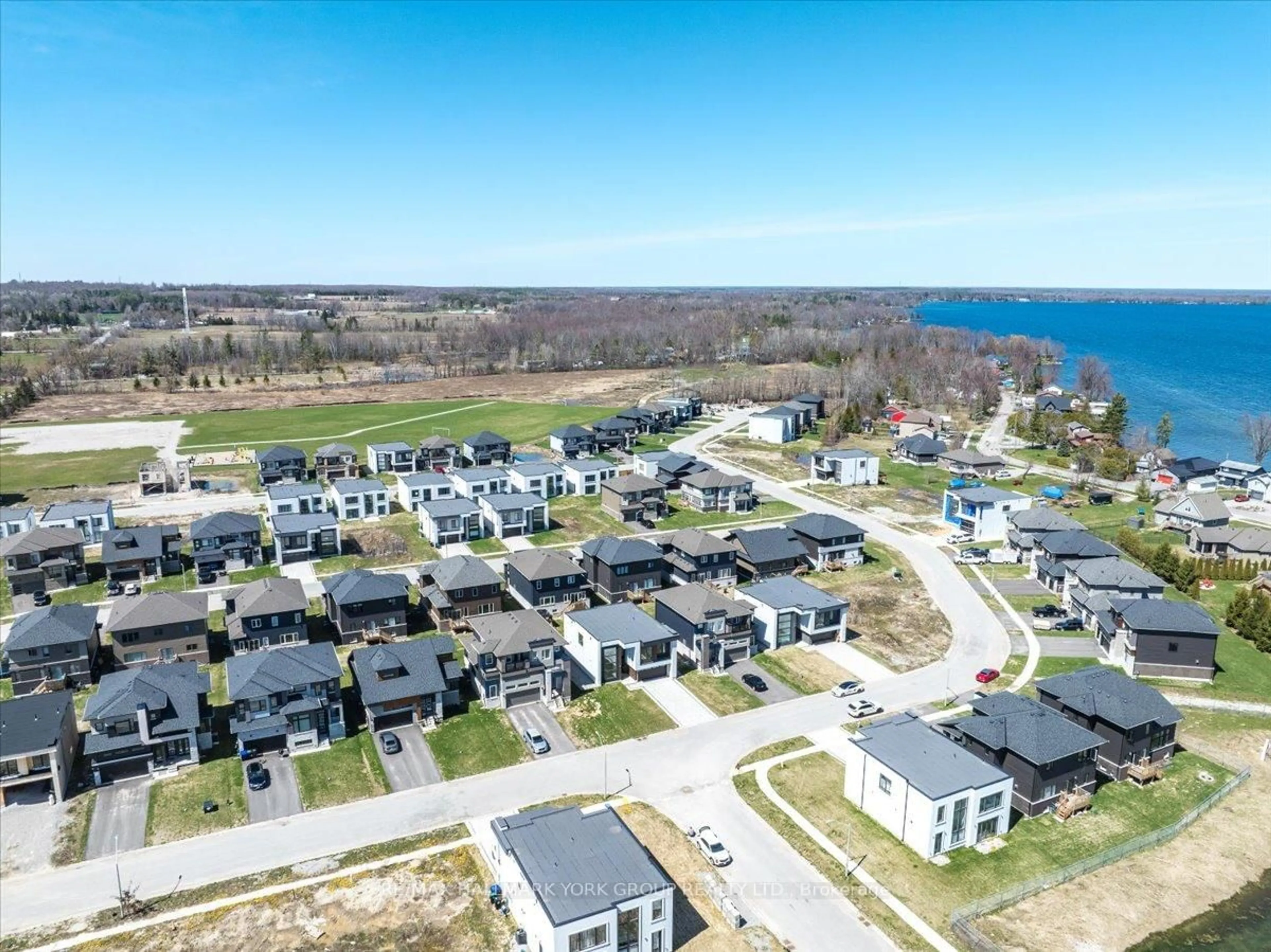 A pic from outside/outdoor area/front of a property/back of a property/a pic from drone, water/lake/river/ocean view for 3740 Lakepoint Dr, Severn Ontario L3V 8N1