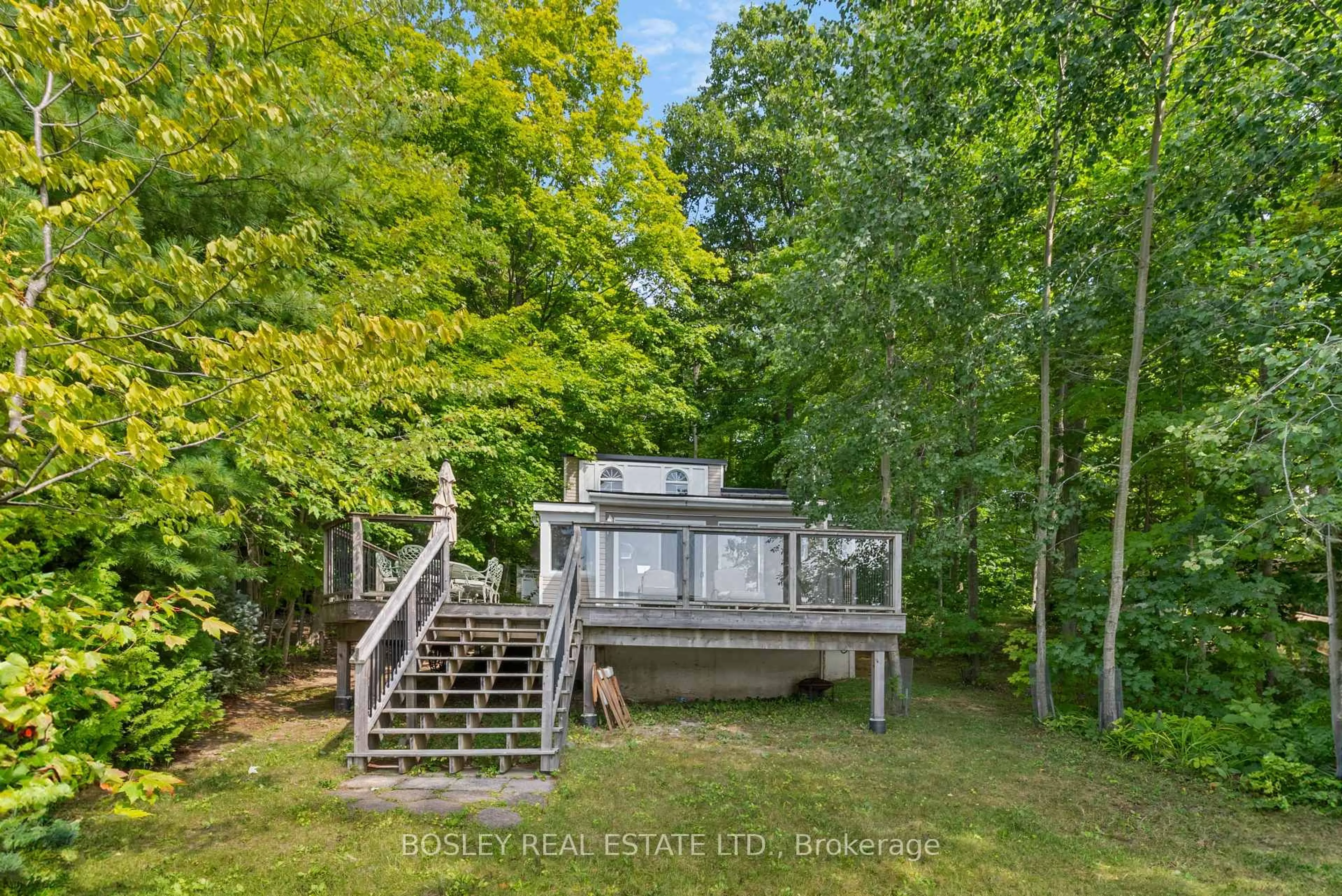 A pic from outside/outdoor area/front of a property/back of a property/a pic from drone, water/lake/river/ocean view for 150 Farlain Lake Rd #Cottage, Tiny Ontario L9M 0B5