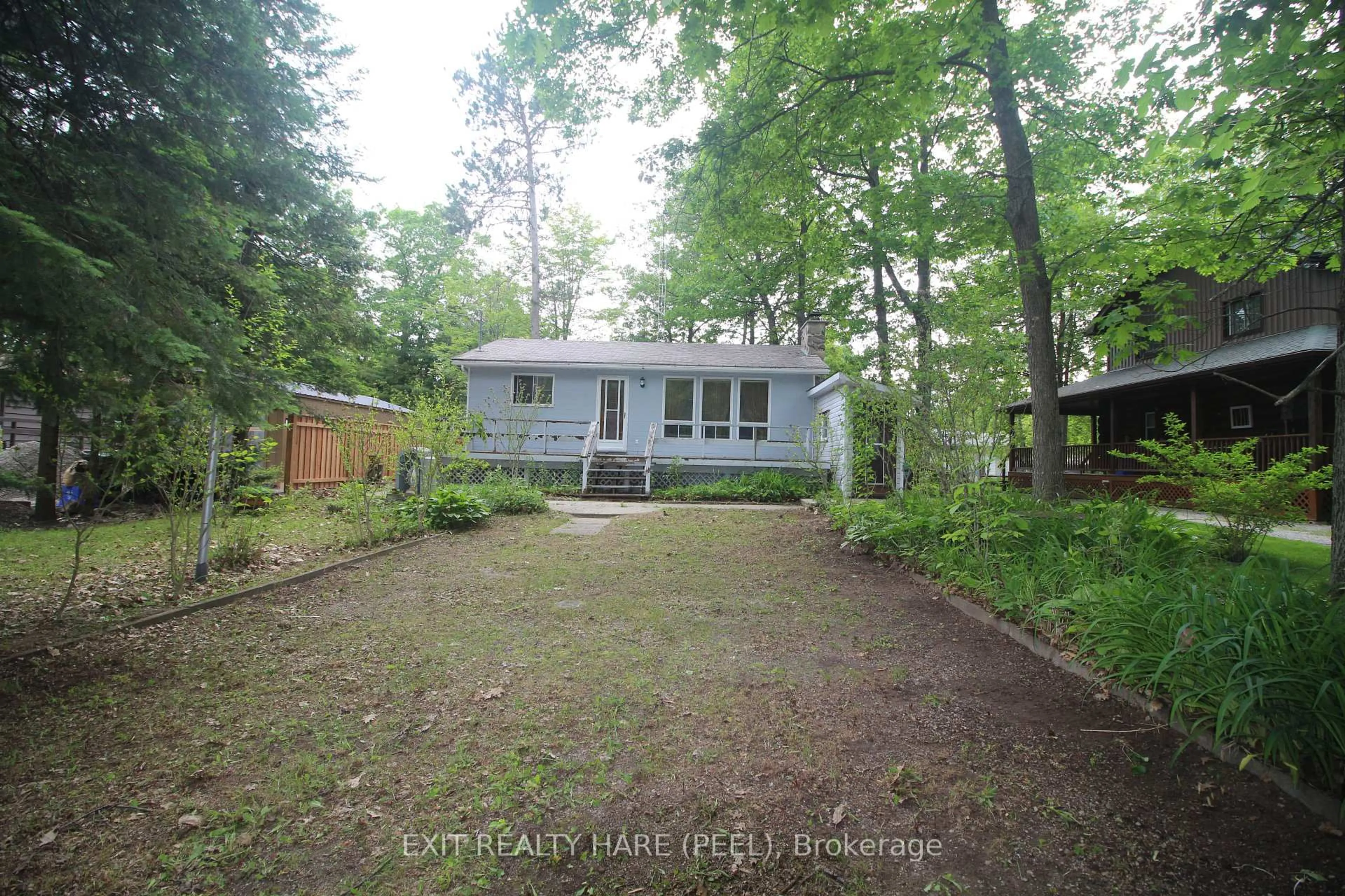 A pic from outside/outdoor area/front of a property/back of a property/a pic from drone, forest/trees view for 126 Woodward Dr, Tiny Ontario L0L 2J0